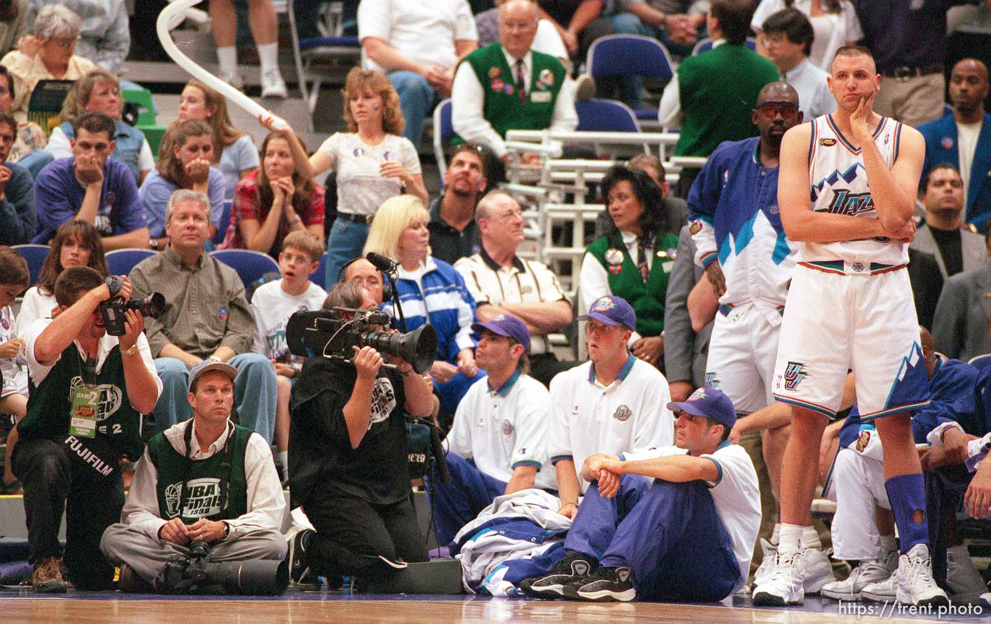 Rick Egan (bottom left) and Greg Ostertag looking glum in final losing seconds at Jazz vs. Bulls game 2, NBA Finals. Bulls won.