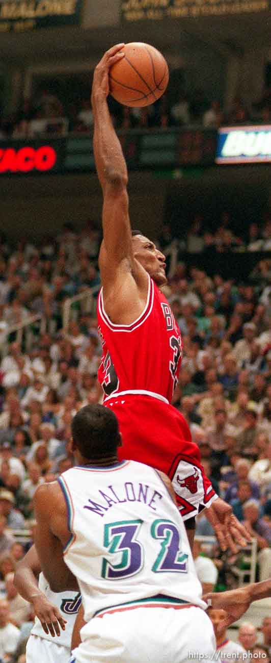 Scottie Pippen dunks over Karl Malone at Jazz vs. Bulls game 2, NBA Finals. Bulls won.