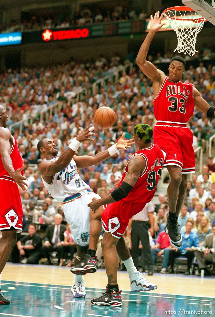 Karl Malone loses the ball while Dennis Rodman and Scottie Pippen defend at Jazz vs. Bulls game 2, NBA Finals. Bulls won.