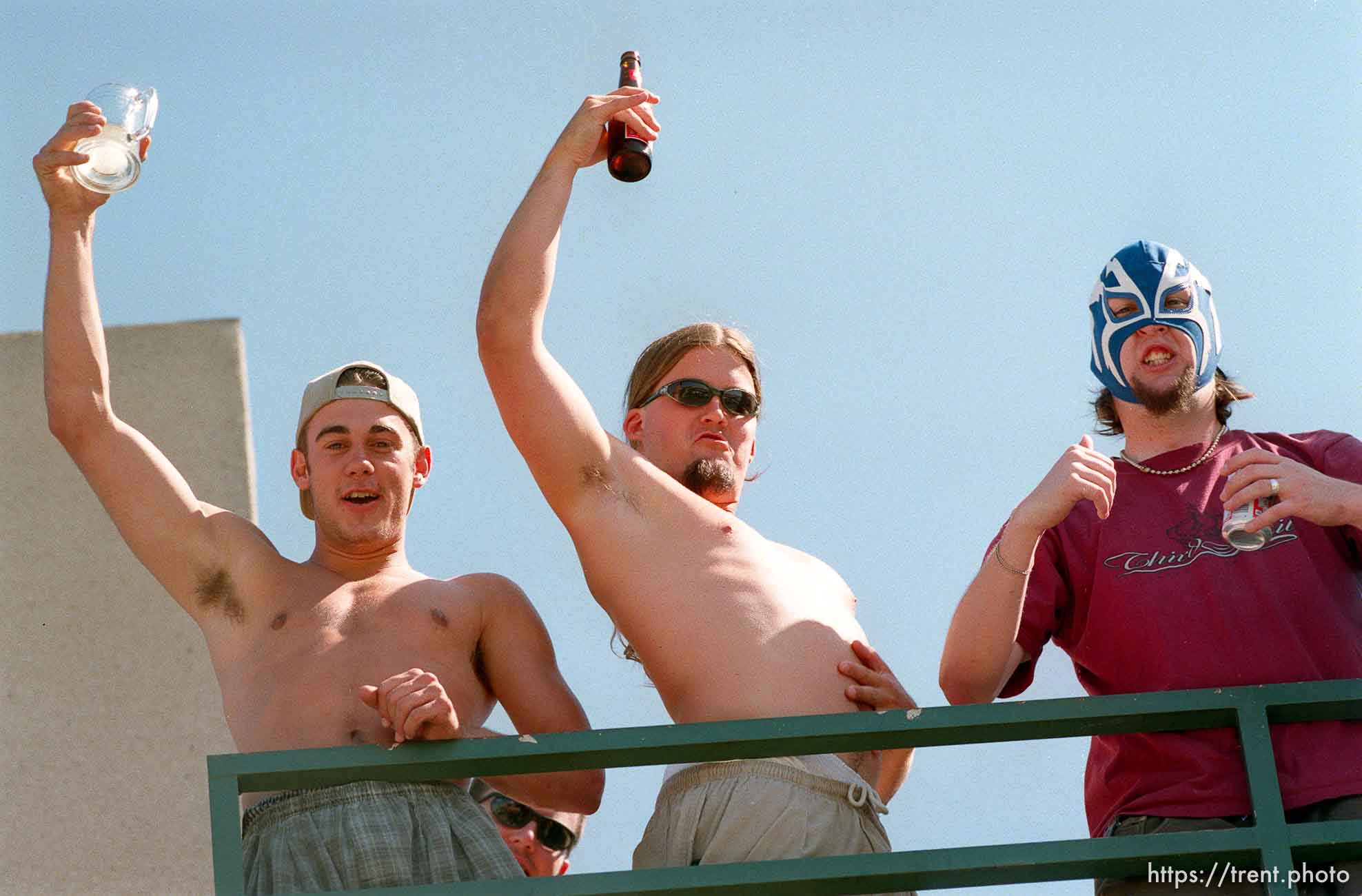 Frat boy wrestling fans outside of WCW's bash at the beach.