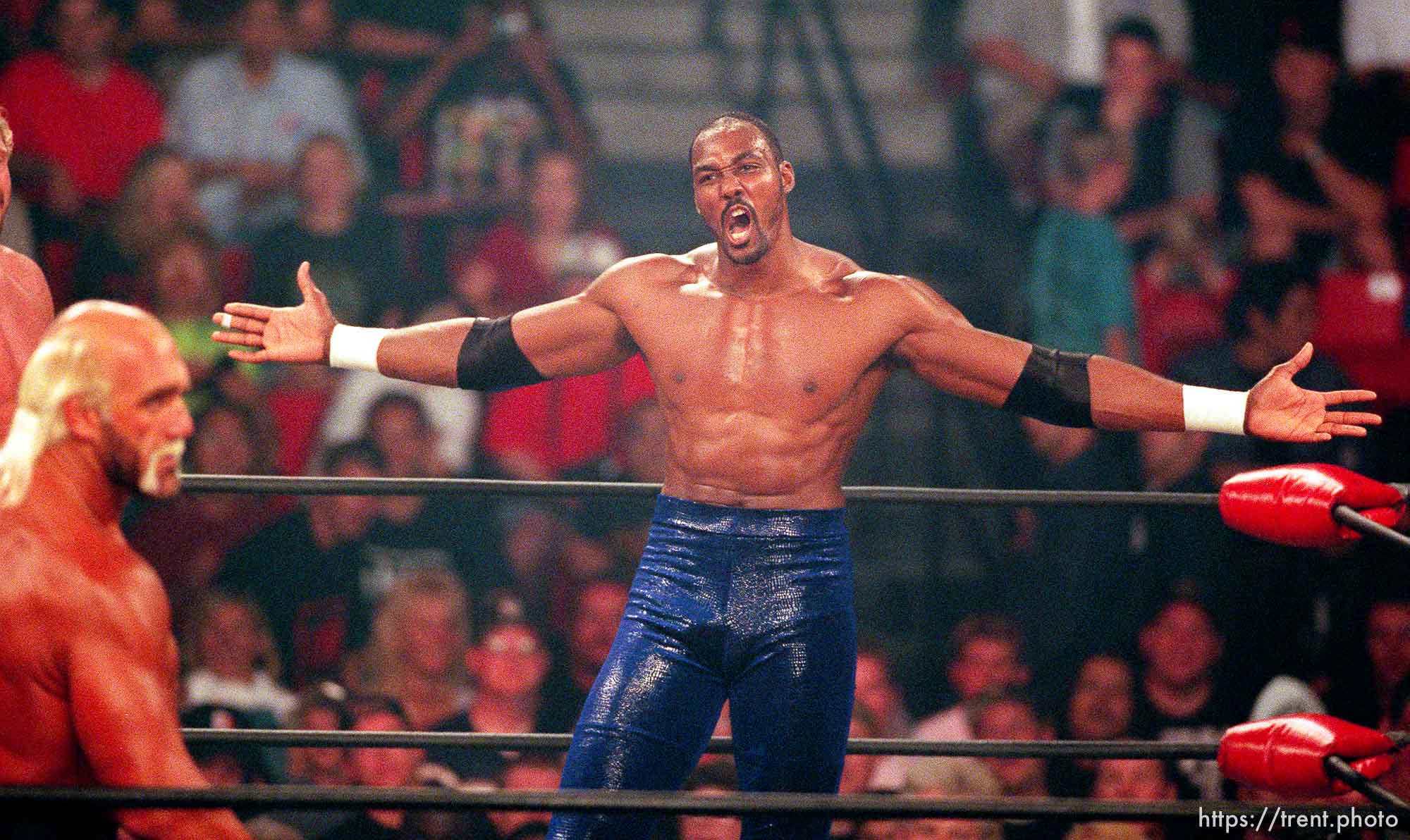 Karl Malone taunts Hollywood Hulk Hogan at WCW's Bash at the Beach.