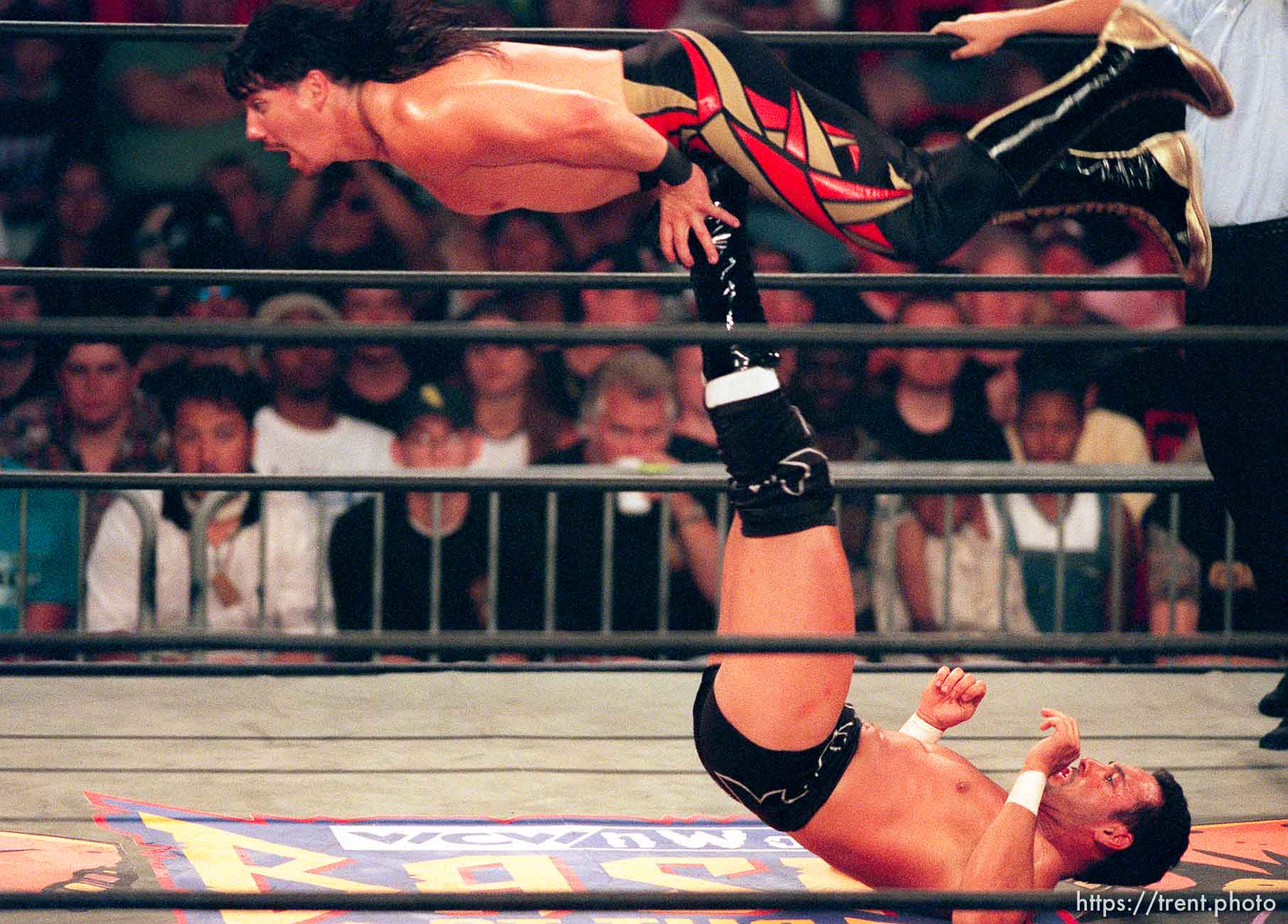 Chavo Guerrero Jr. flips Eddie Guerrero at WCW's Bash at the Beach.