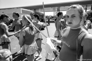 Cyprus High School Spinnakers drill team with sabres at the 4th of July parade on Main Street.