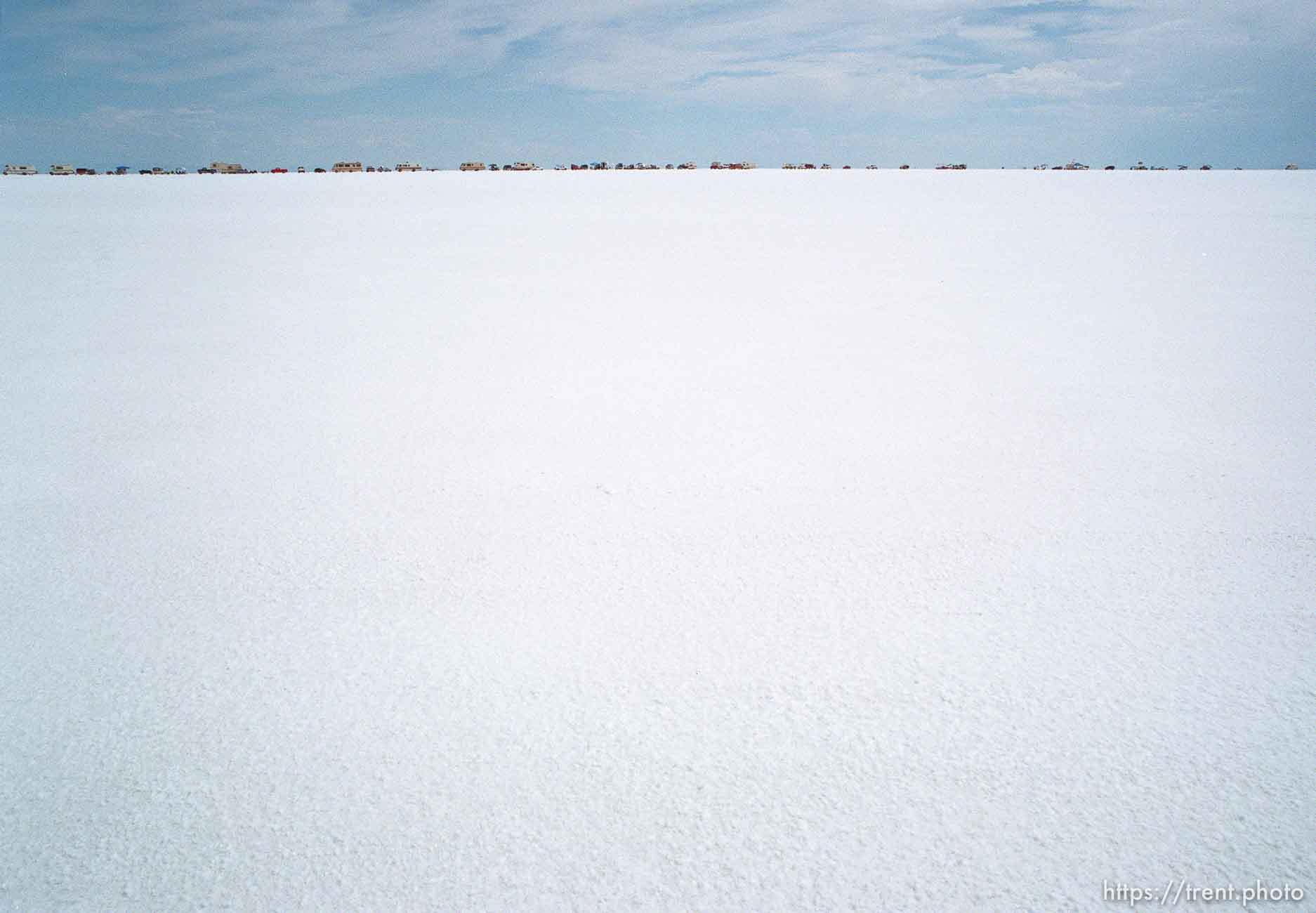 Cars and RV's lined up at the Bonneville Salt Flats to watch Speed Week.