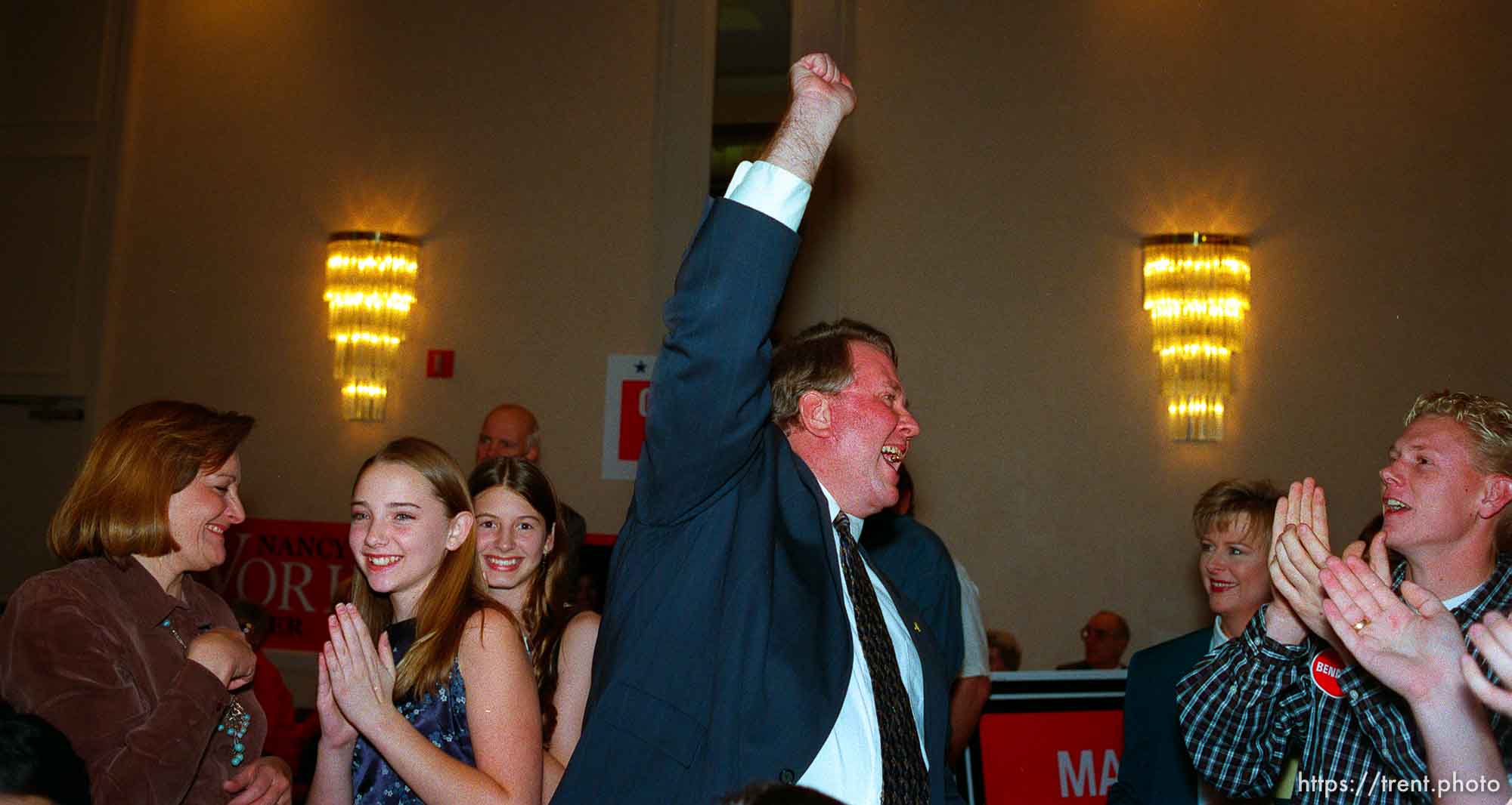 Republican congressman Merrill Cook pumps his fist as he overtakes opponent Lily Eskelsen in the returns on election night. Cook won his re-election