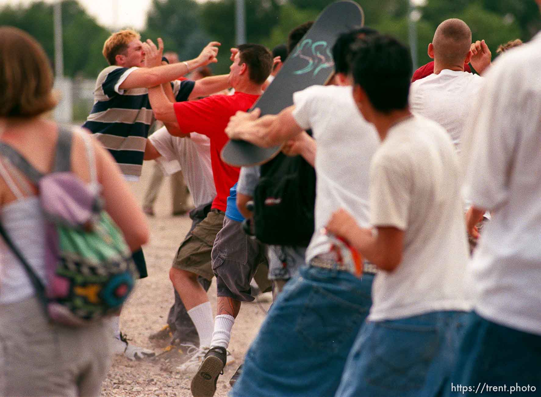 Straightedge kids stomp someone at the Vans Warped Tour.