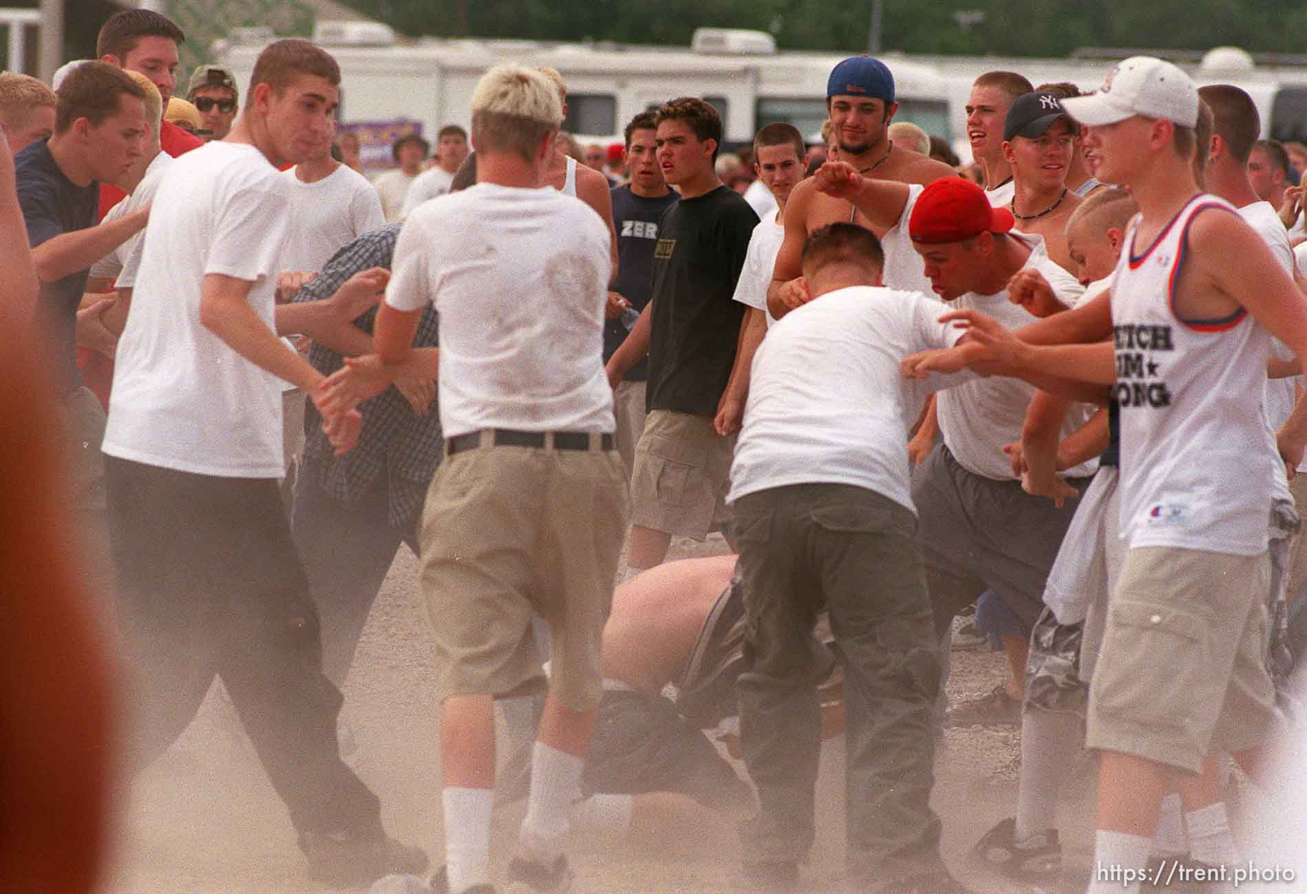 Straightedge kids stomp someone at the Vans Warped Tour.