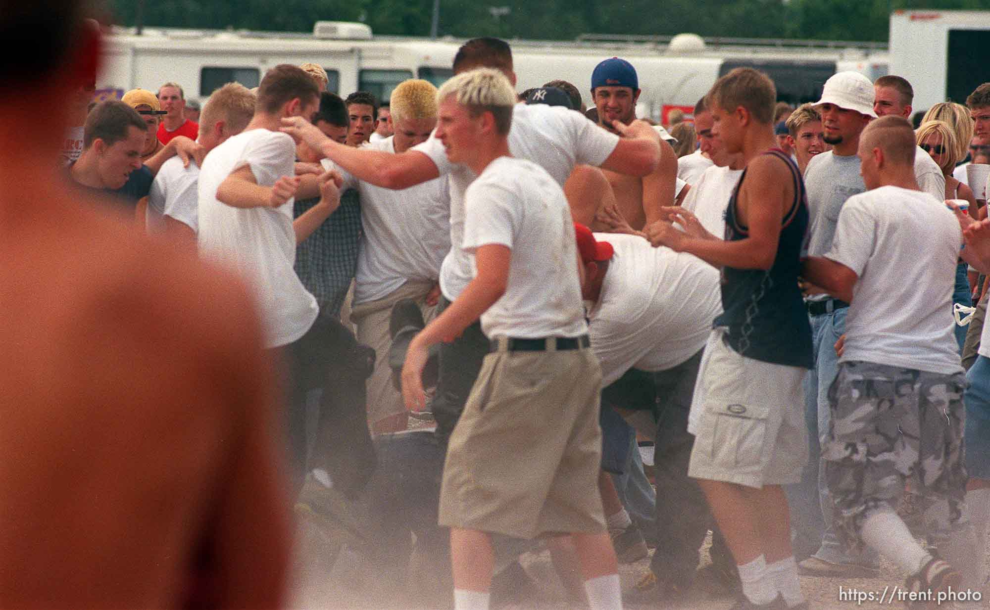 Straightedge kids stomp someone at the Vans Warped Tour.