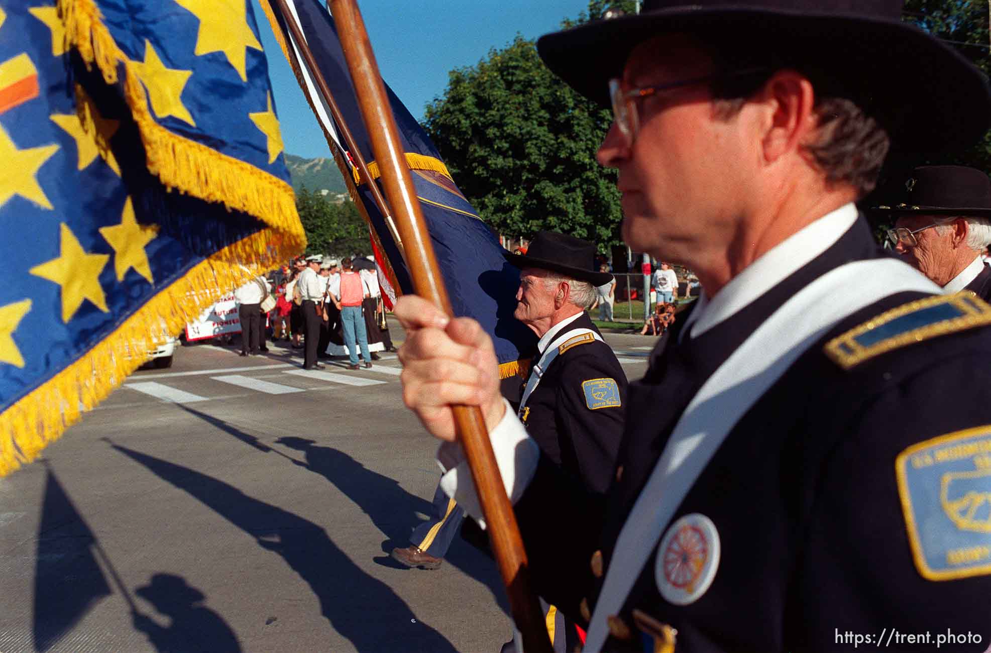 Jay Bowen (center) carries the Utah State flag with the United States Mormon Battalion in the Bountiful Hand-Cart Festival Parade