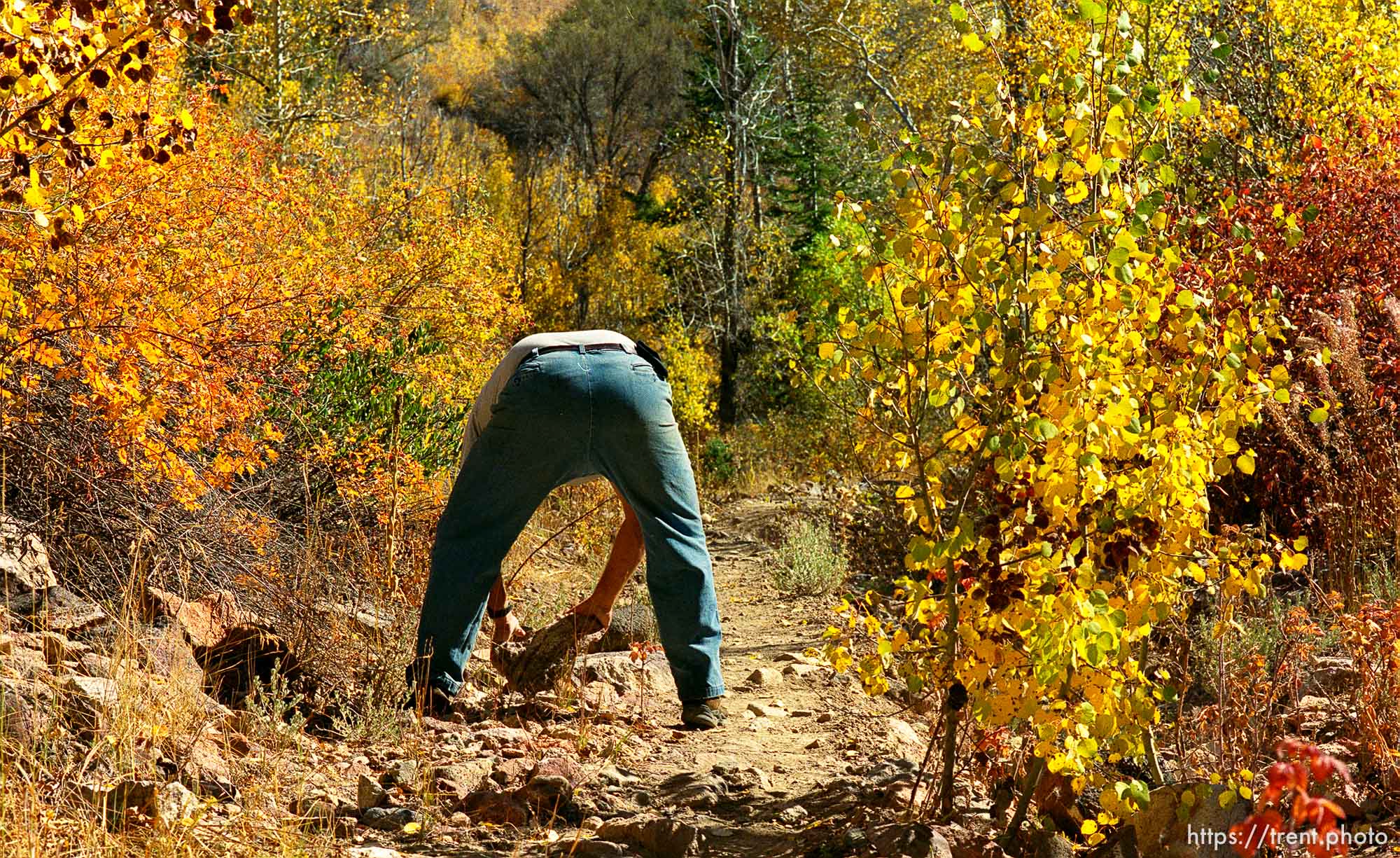 An unidentified man works at clearing South Canyon Road. A restraining order kept large numbers of people from re-building the road as planned Saturday in Jarbidge, NV. Instead of the hundreds organizers expected, approximately ten people did very minor work.