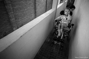 Hexi pushes Doris. Formerly conjoined twins, Bessy and Doris Gonzales.