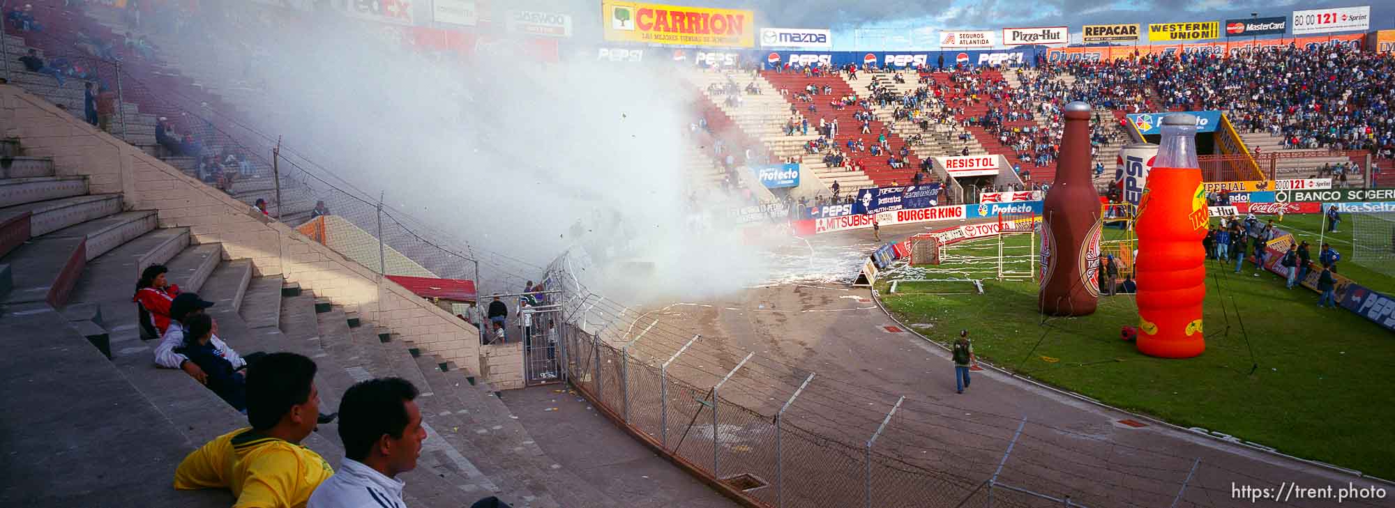 Smoke and fire at Montagua vs. Federal soccer at the National Stadium.