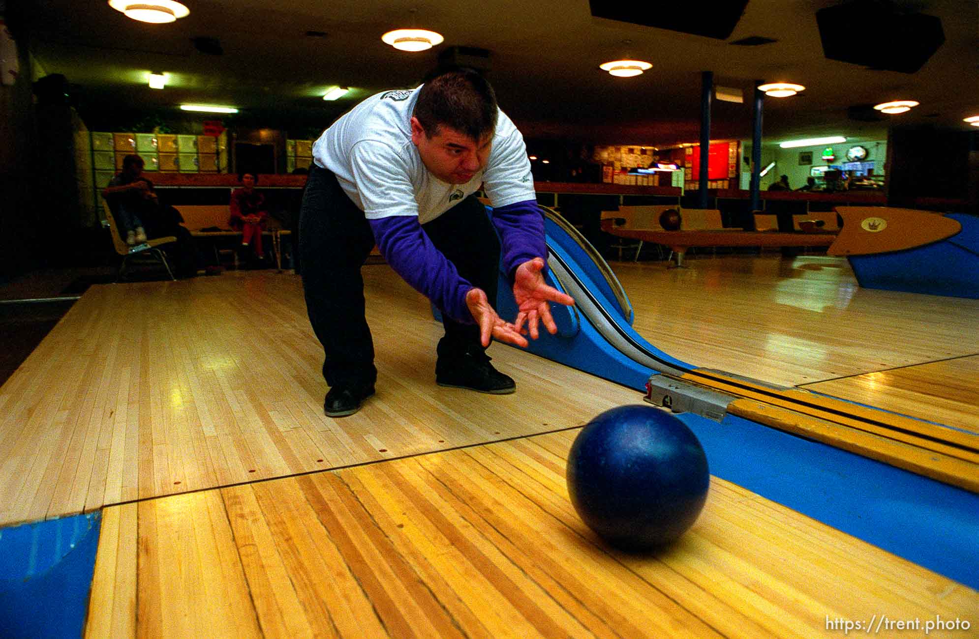 Disabled kids bowling and playing videogames.