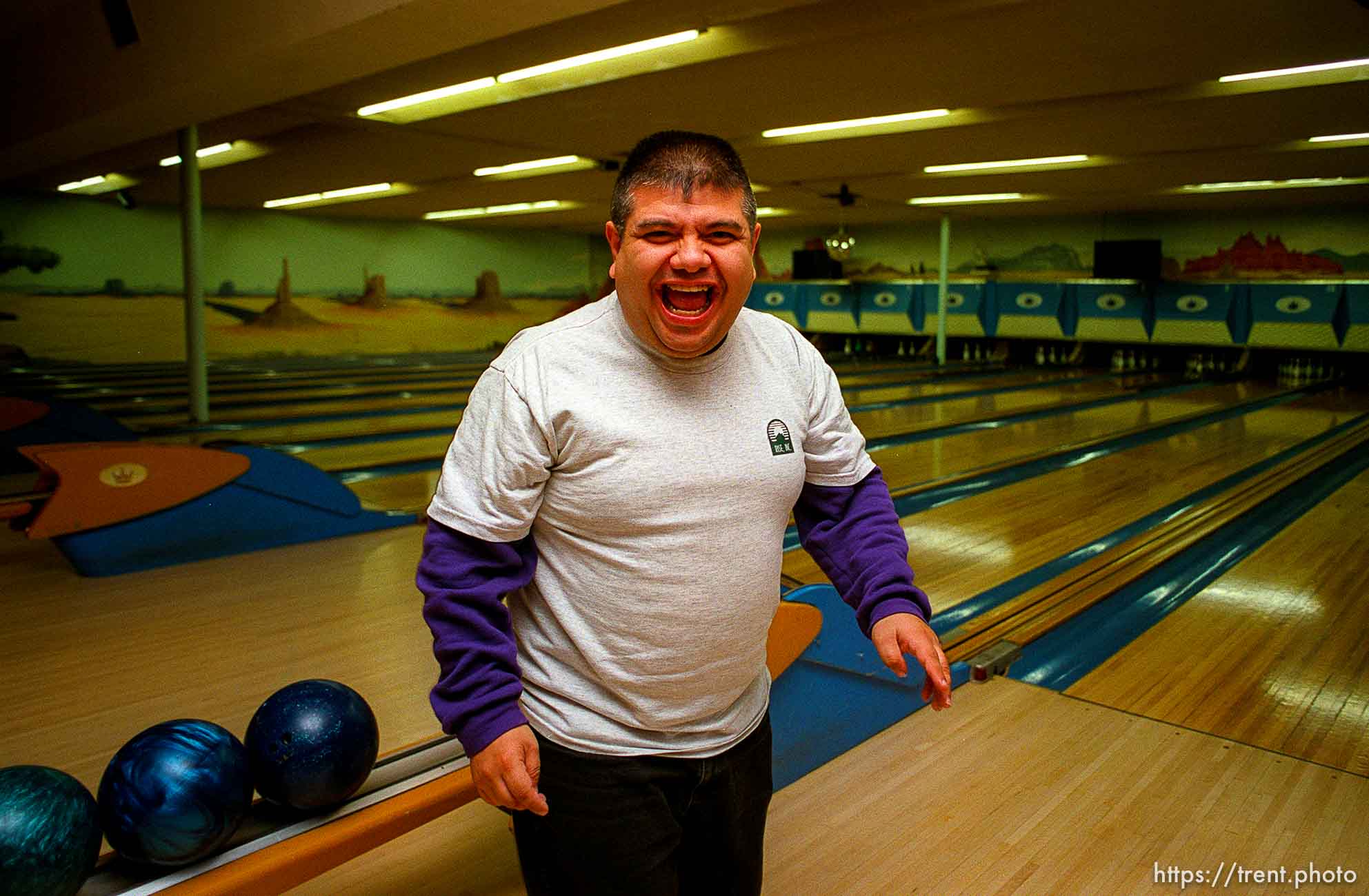 Disabled kids bowling and playing videogames.