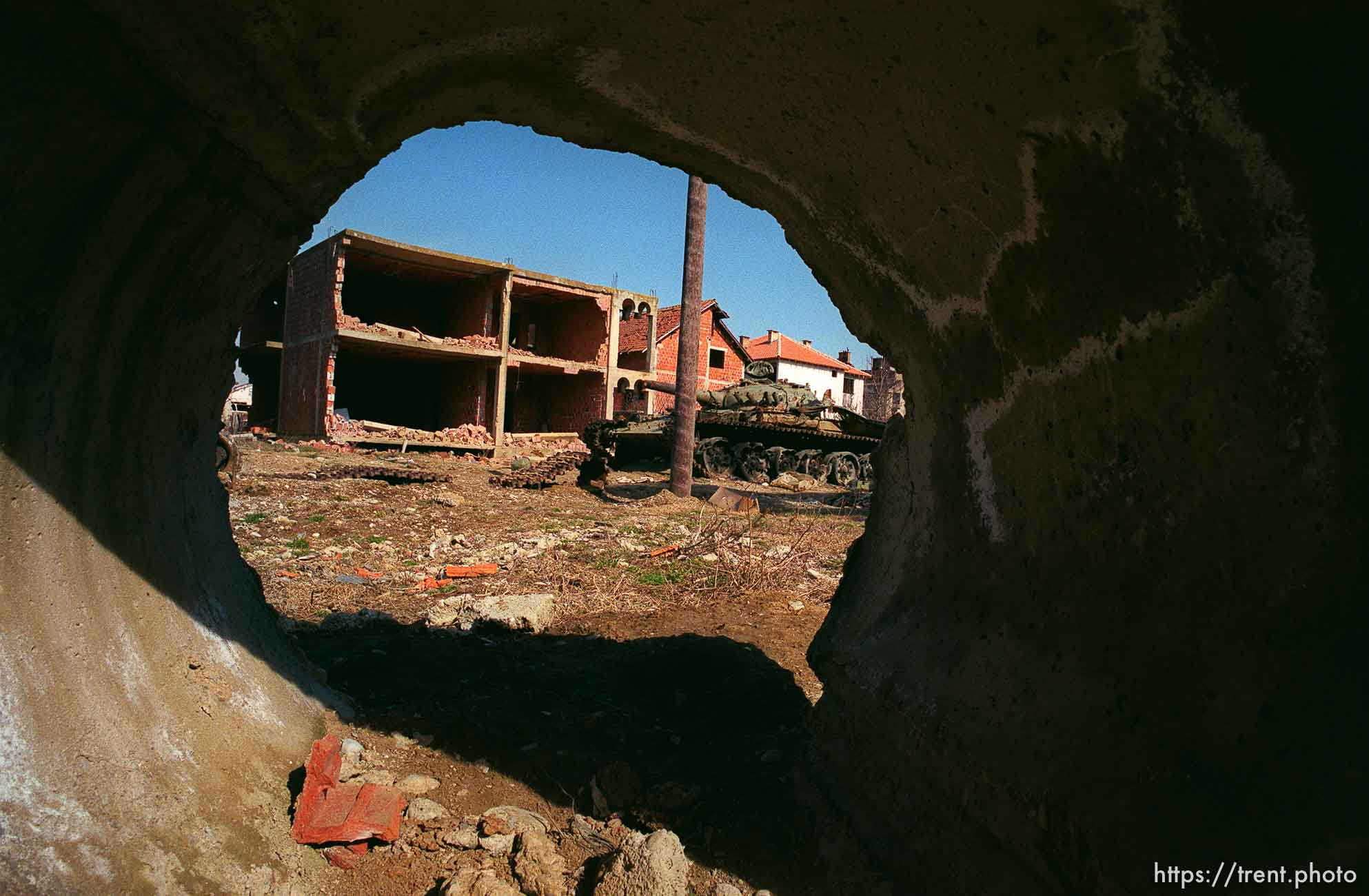 Destroyed homes and a tank.