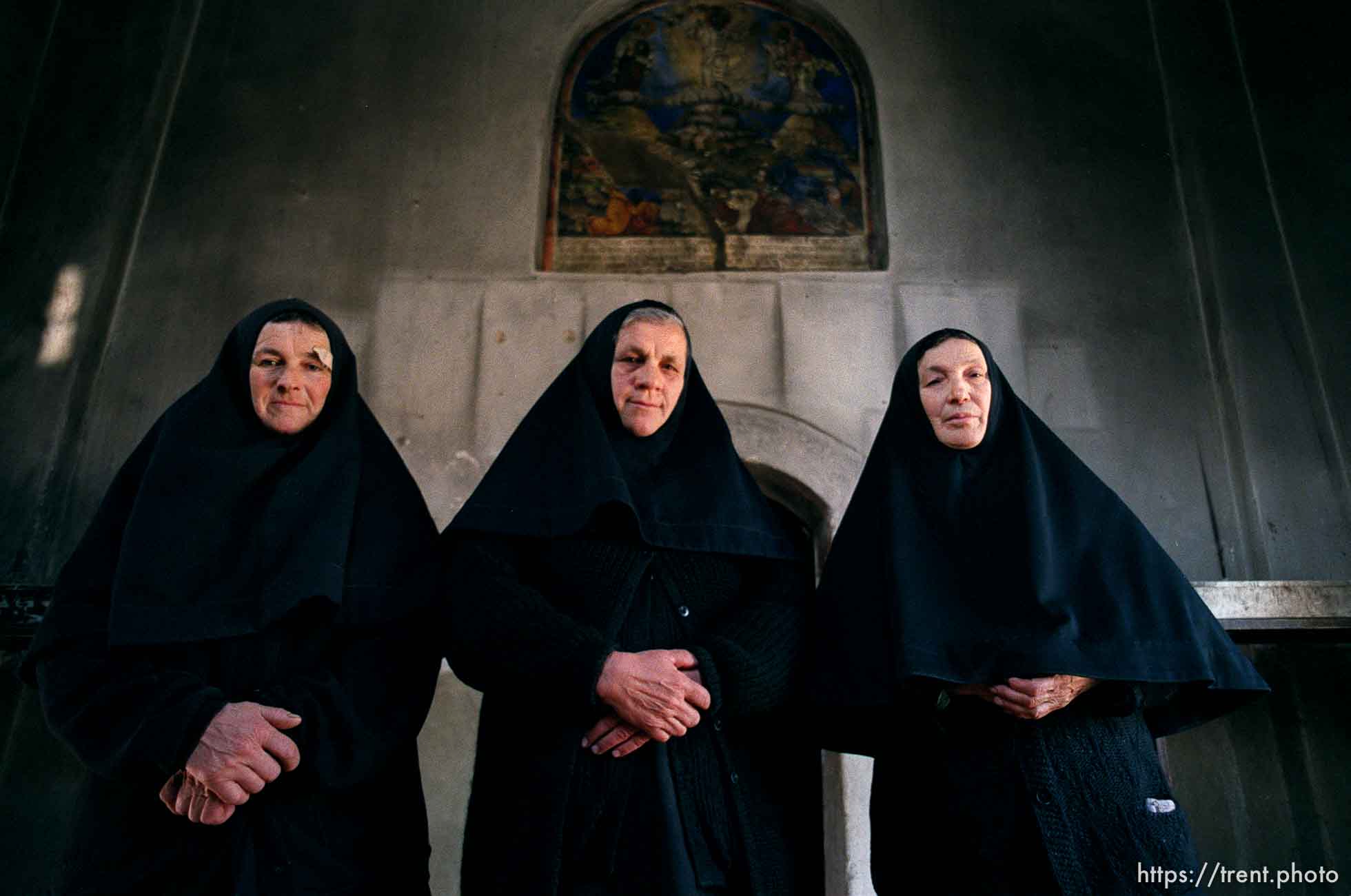 Three Serbian nuns and their 14th Century Orthodox Church, now guarded by KFOR soldiers.