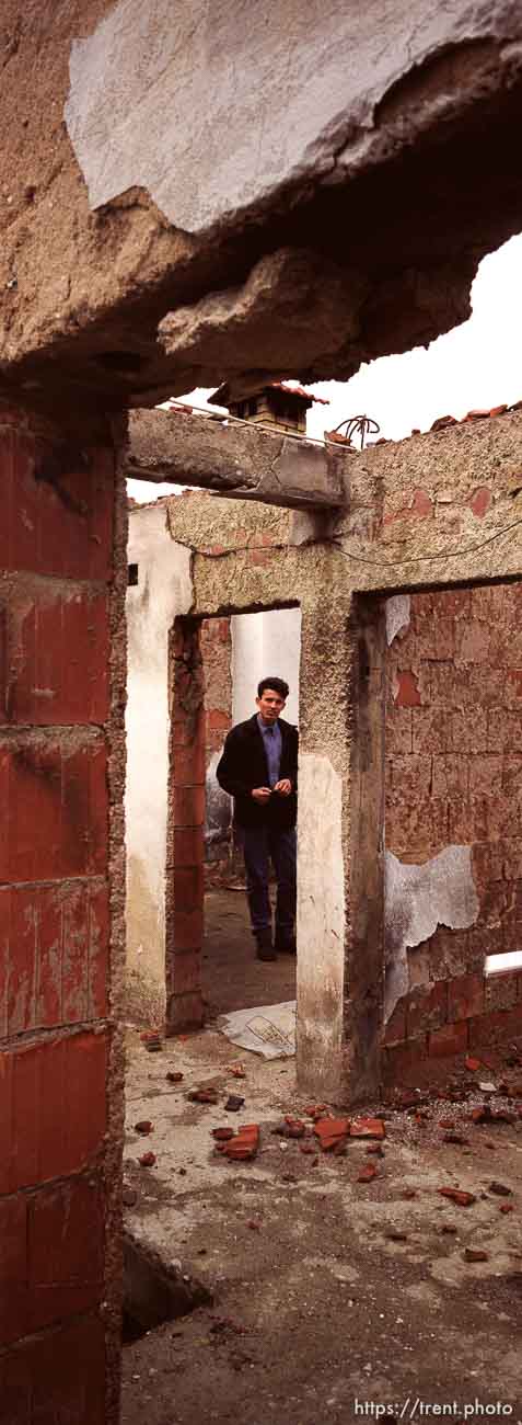 Anton in his bombed-out house.