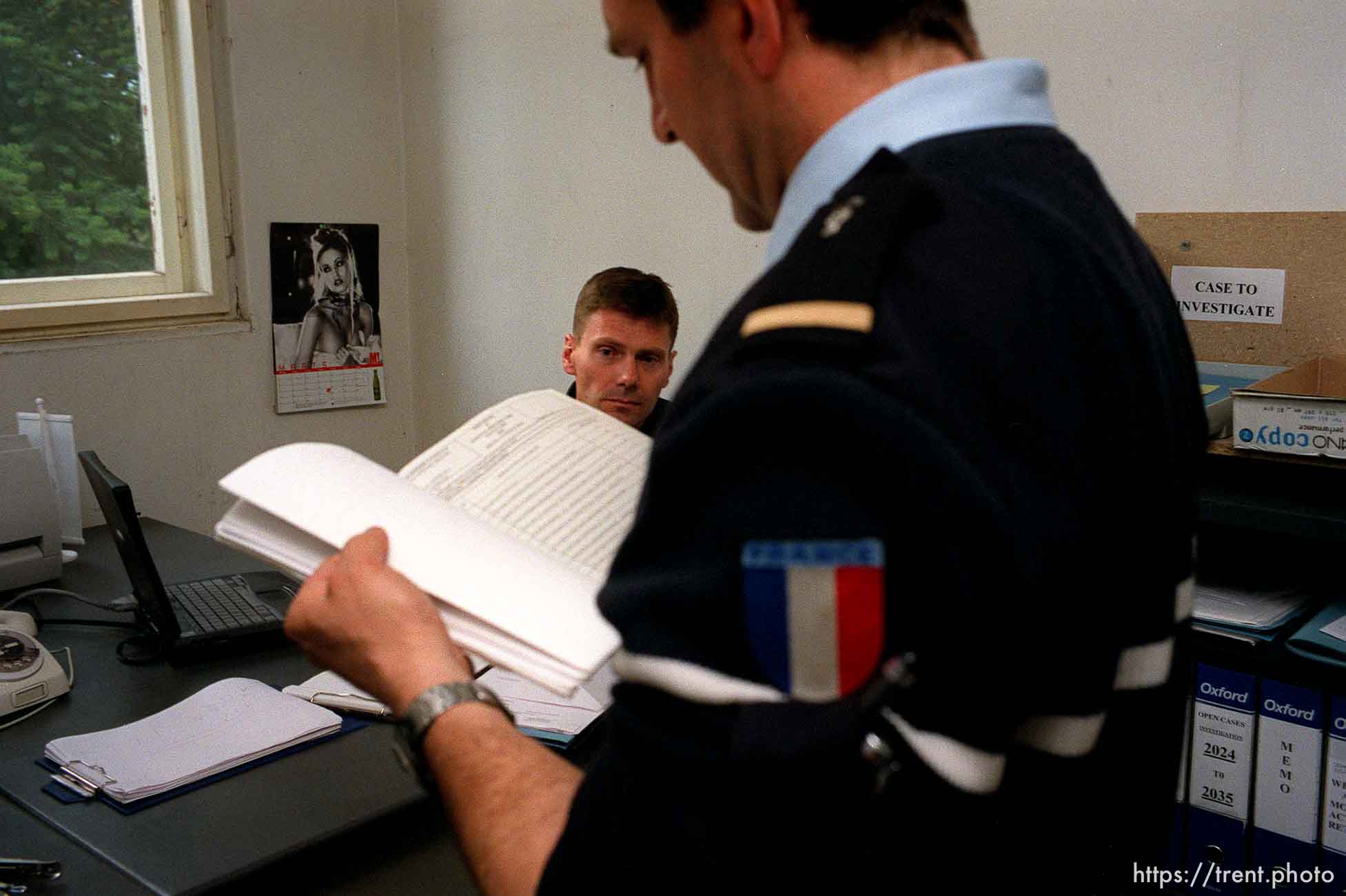 UNMIK police officer Zane Smith working on a homicide case with his team leader Dominique Lacroute