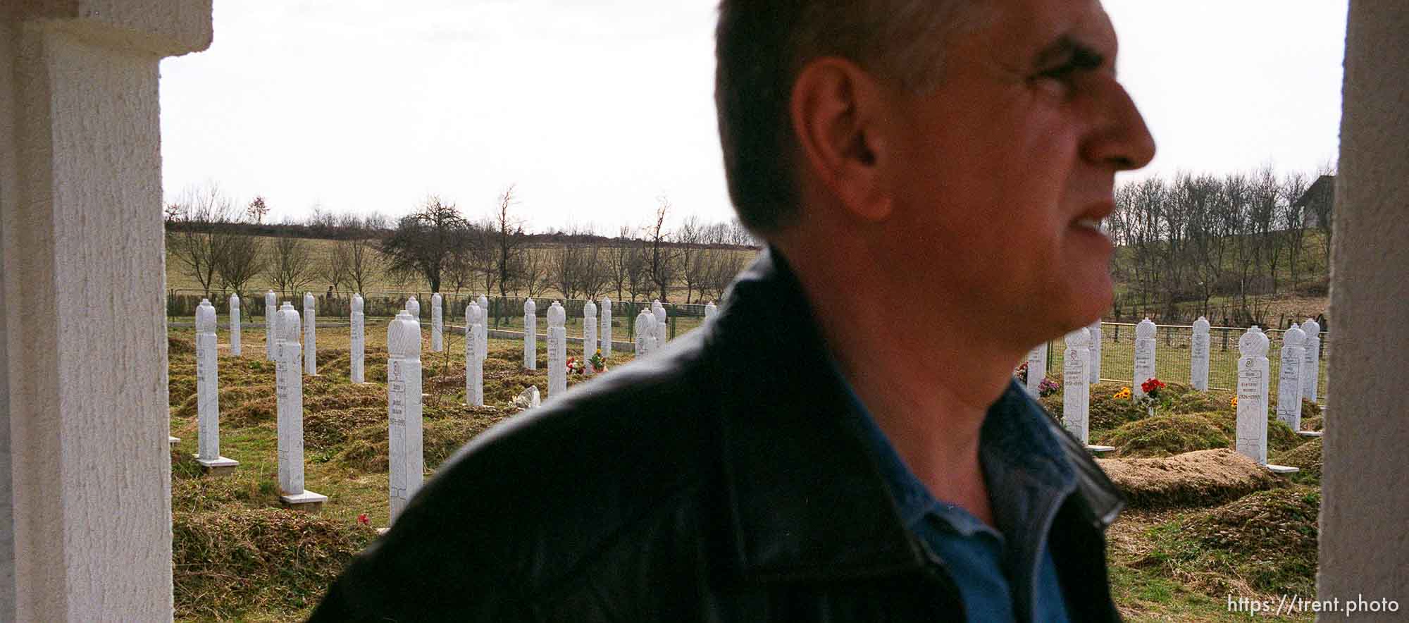 Redzo Kurbegovic at the cemetery and memorial for victimes of a massacre by Serbs.