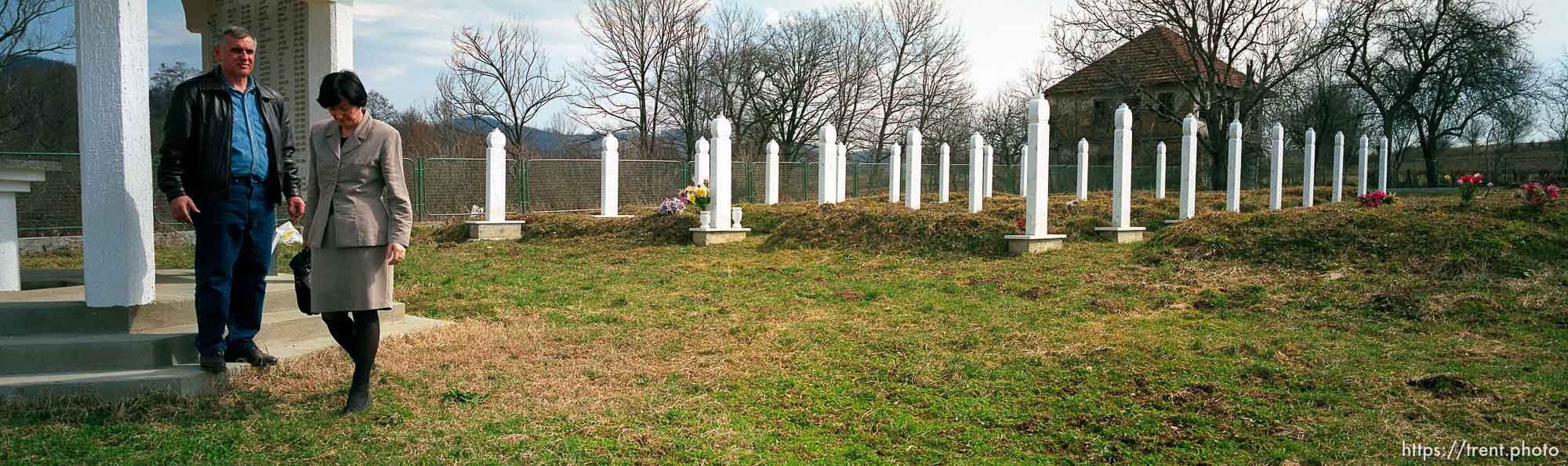 Redzo and Fatima Kurbegovic at the cemetery and memorial for people killed in a massacre by Serbs.