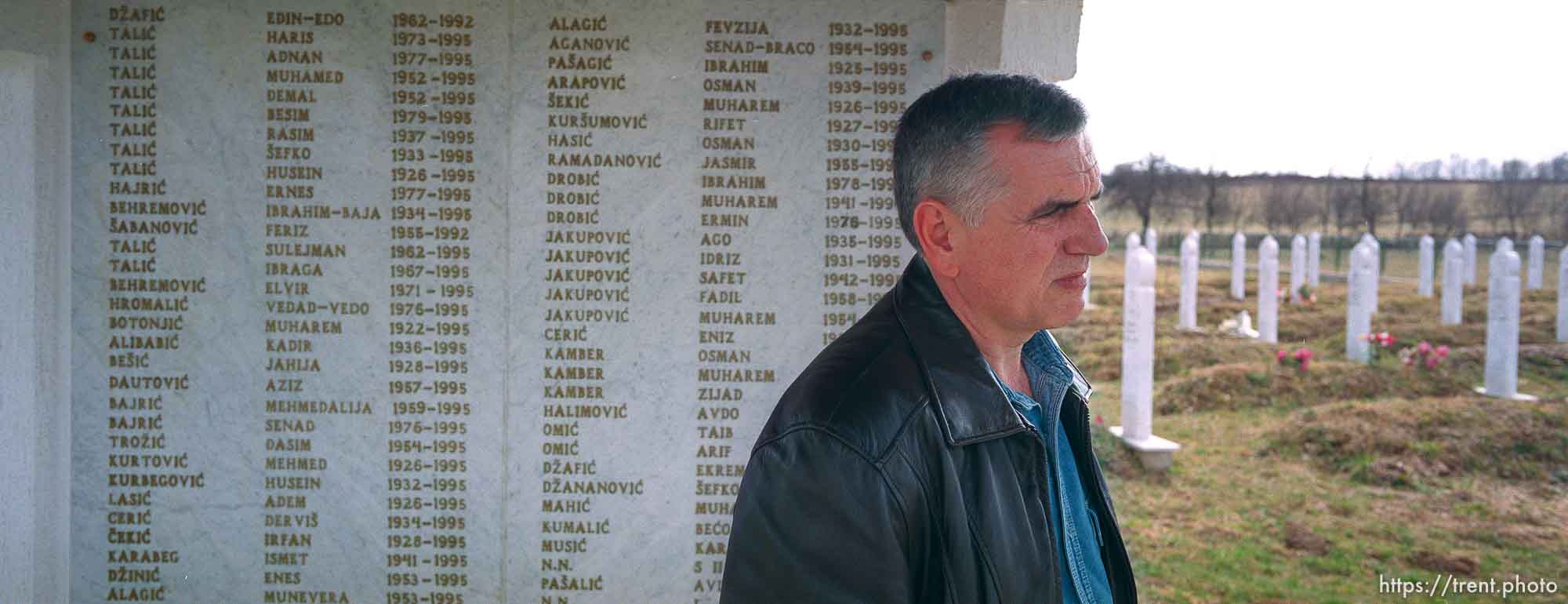 Redzo Kurbegovic at the memorial and cemetery for the victims of a massacre by Serbs.