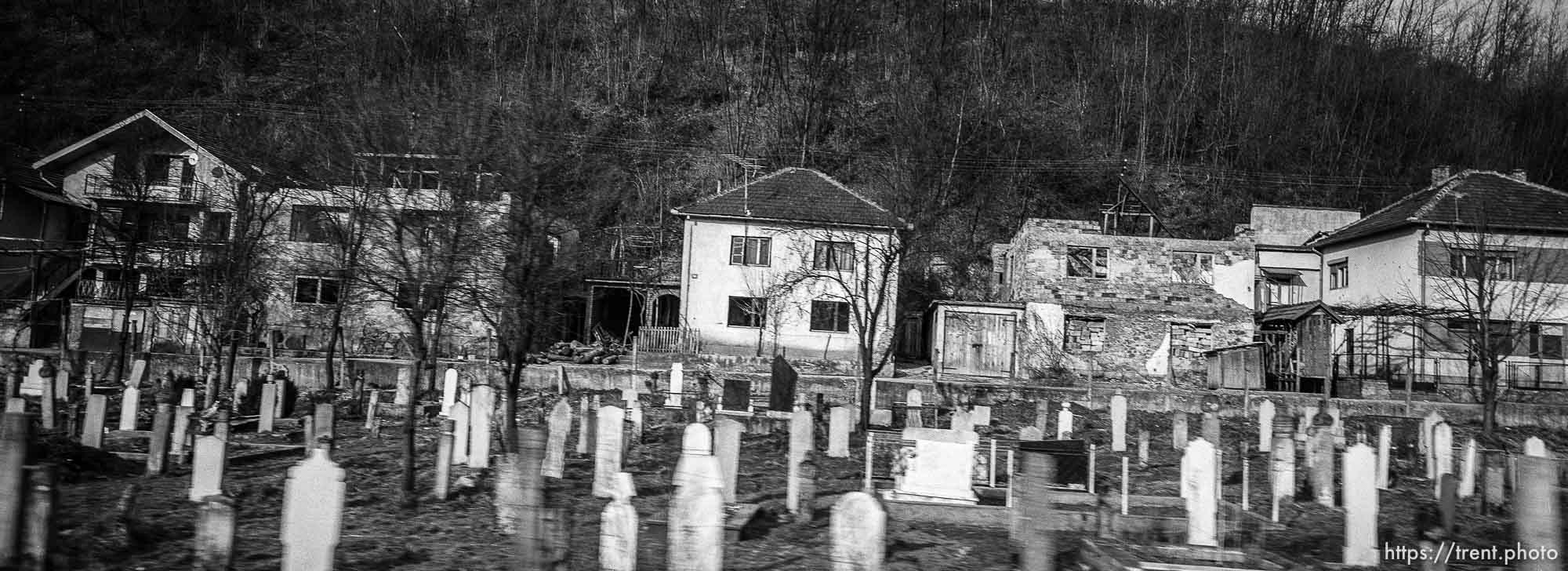 Cemetery and ruined homes on the drive to Zagreb, Croatia.