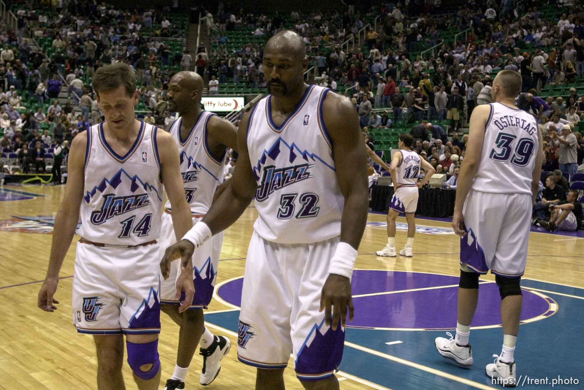 Jeff Hornacek, Bryon Russell, Karl Malone, John Stockton, Greg Ostertag walk off the floor at the end at Utah Jazz vs. Portland Trailblazers. Game 3, 2nd round NBA Playoffs. Trailblazers won to take 3-0 advantage in series, which they eventually won.