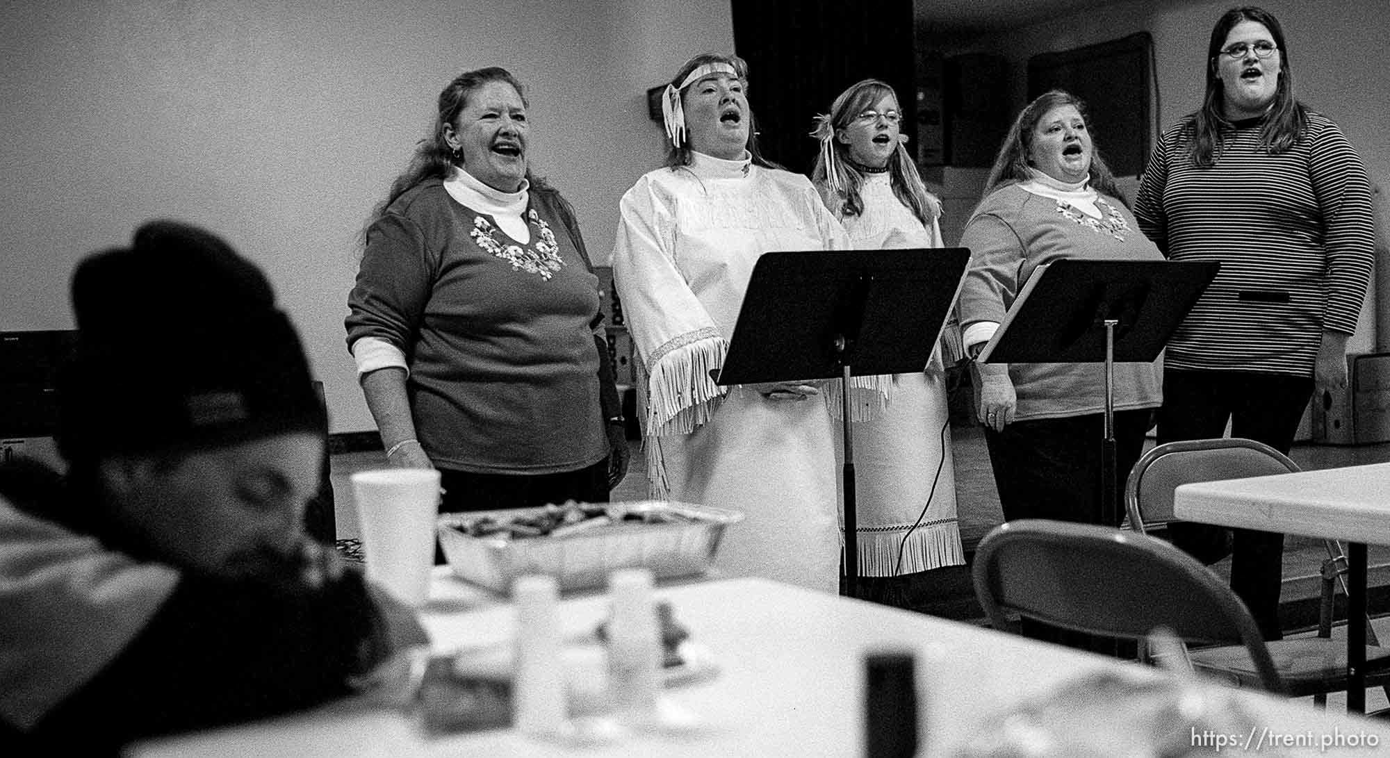 Julie Reeve, Pauline Fitzgerald, Chastadi Reeve, RaVae Bobo, April Marden singing. Thanksgiving dinner at the Salt Lake City Mission.