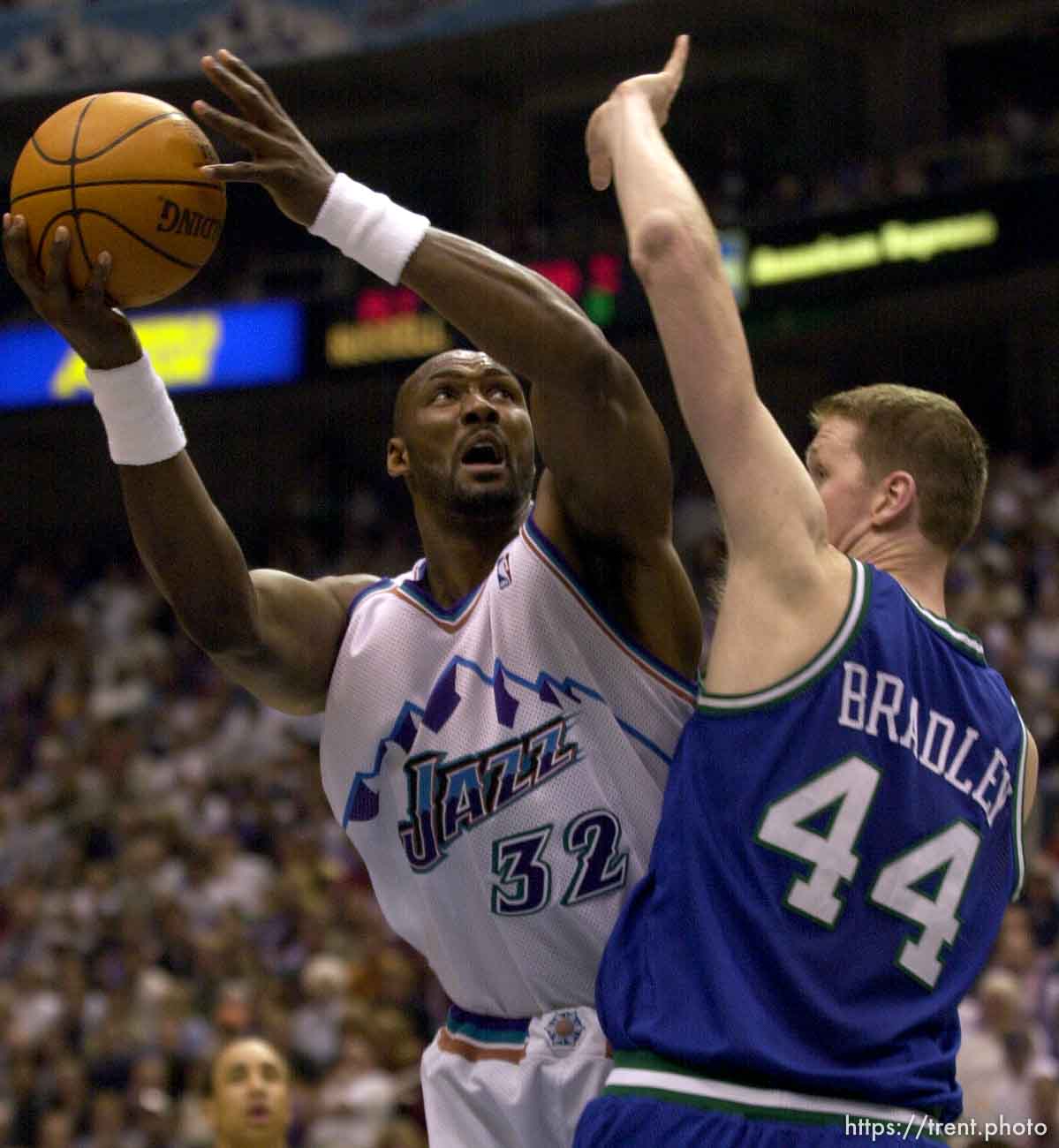 Karl Malone shoots over Shawn Bradley as the Utah Jazz face the Dallas Mavericks in game five of their first round playoff series, in Salt Lake City Thursday.  05/03/2001