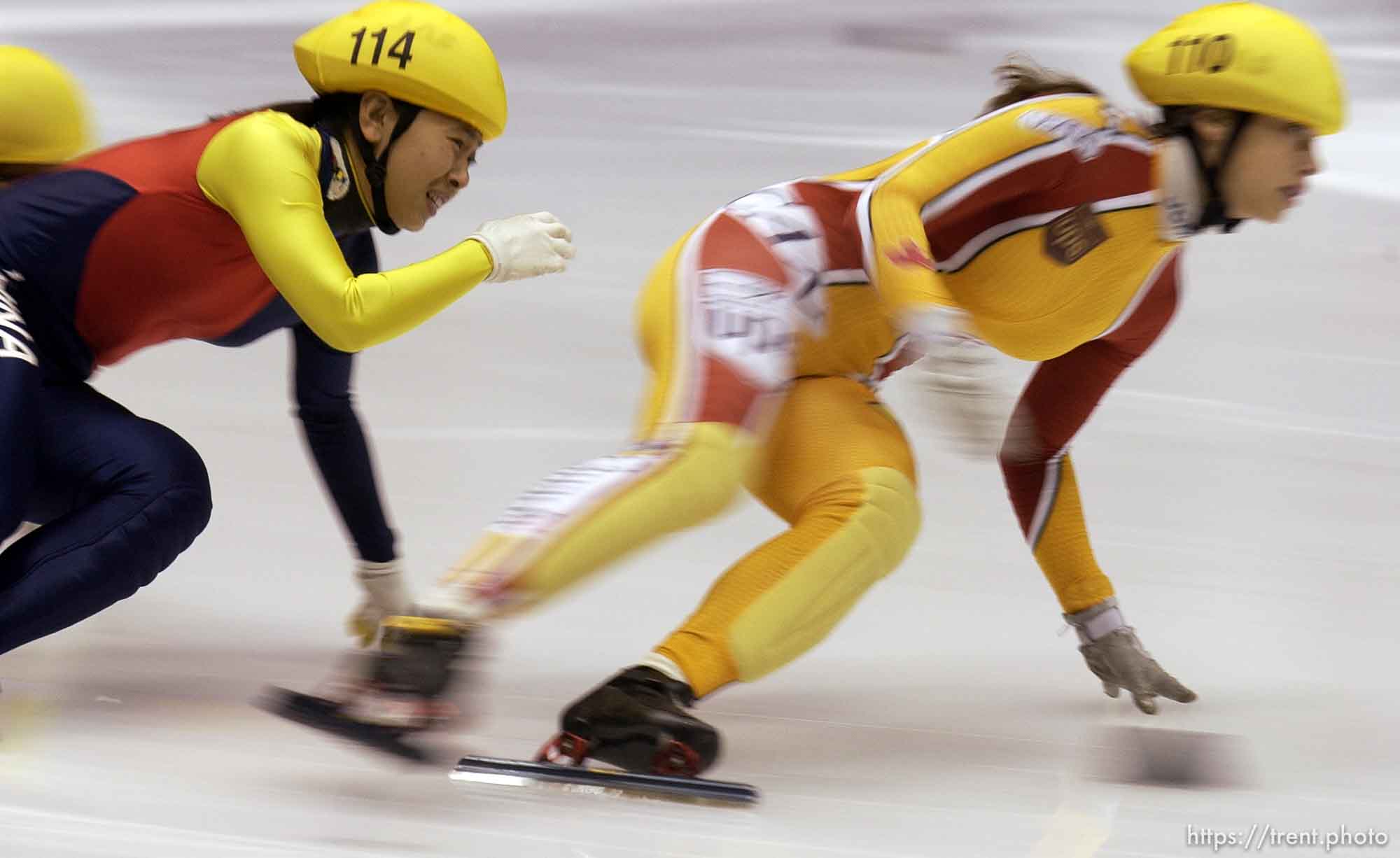 Yang Yang (S), left, and Canada's Alanna Kraus. 500 meter quarterfinal rounds, Short Track Olympic Qualifier at the Delta Center Friday night.
. 10/26/2001, 7:19:39 PM