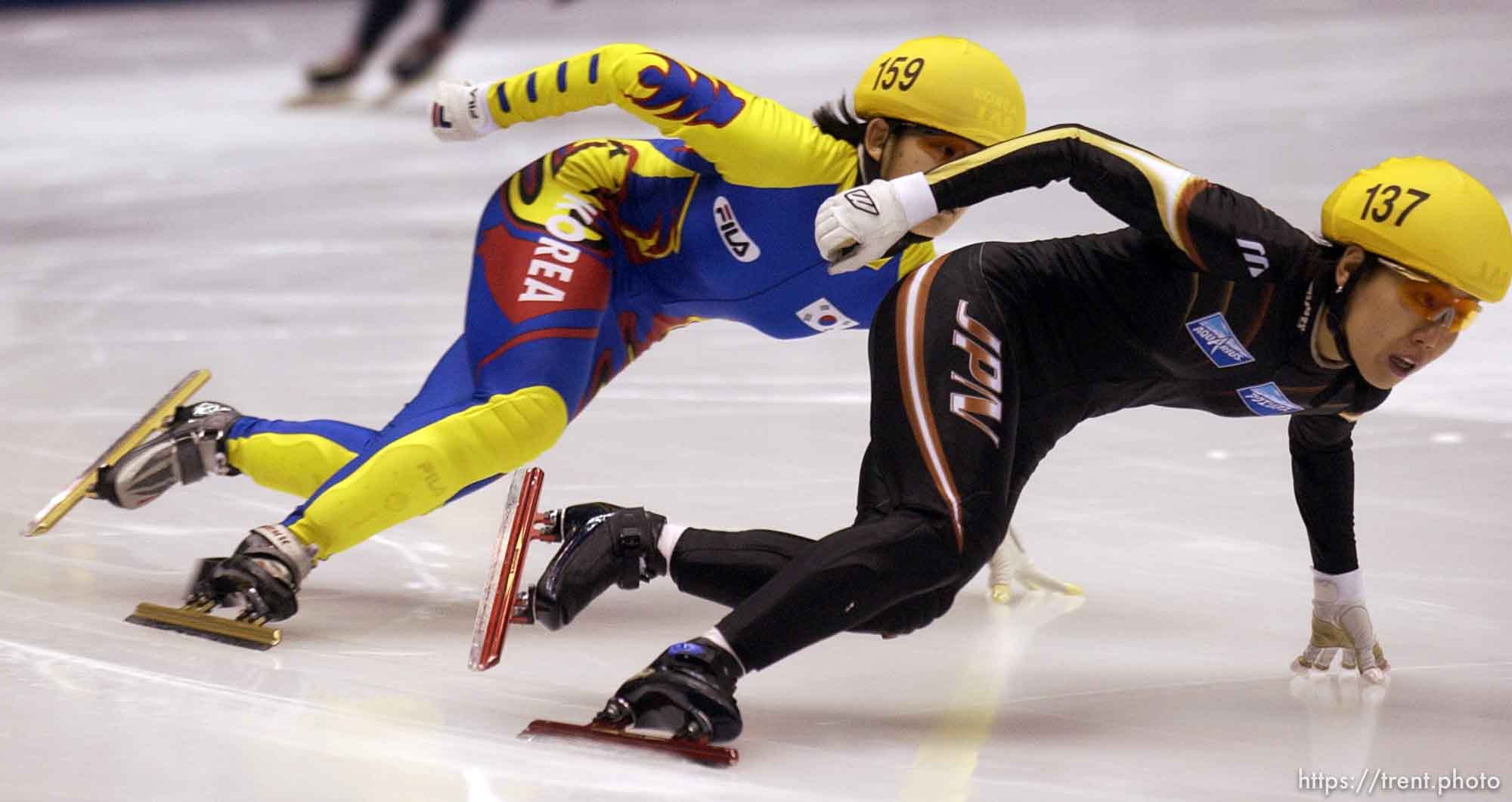 Korea's Min-Jin Joo (159) and Chikage Tanaka (137). 500 meter quarterfinal rounds, Short Track Olympic Qualifier at the Delta Center Friday night.
. 10/26/2001, 7:25:52 PM