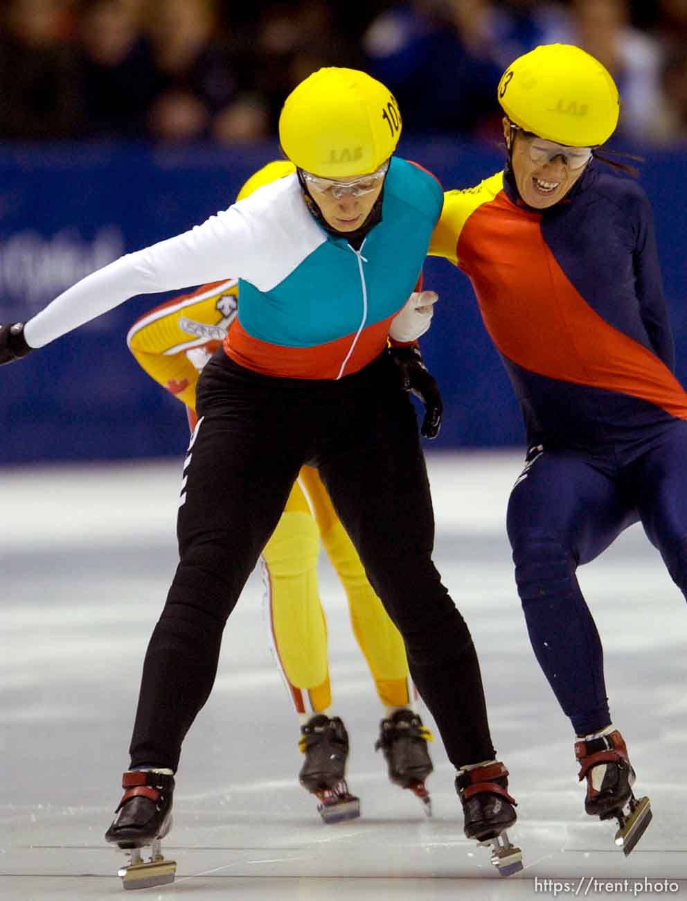 China's Yang Yang (A), right, tries to get ahead of Bulgaria's Evgenia Radanova as they cross the finish line of the 500 meter finals, Short Track Olympic Qualifier at the Delta Center Friday night. Radanova, the world record holder, took first place in the final.
. 10/26/2001, 8:37:06 PM