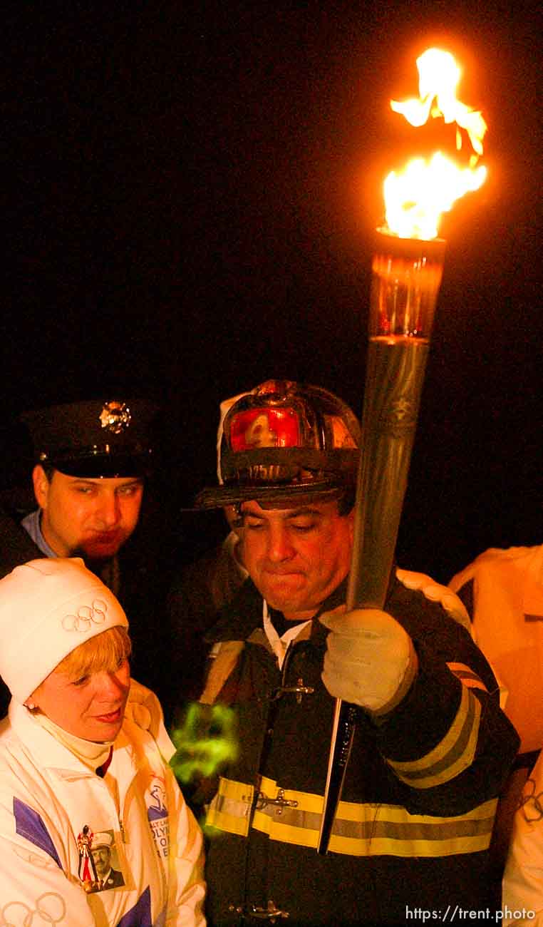 The Olympic Torch commemorates victims and heroes of the World Trade Center attack on a boat near the Statue of Liberty, then proceeds to Rockefeller Plaza where Mayor Giuliani carried the final torch and lit the Olympic cauldron.
 12.23.2001, 5:43:23 PM