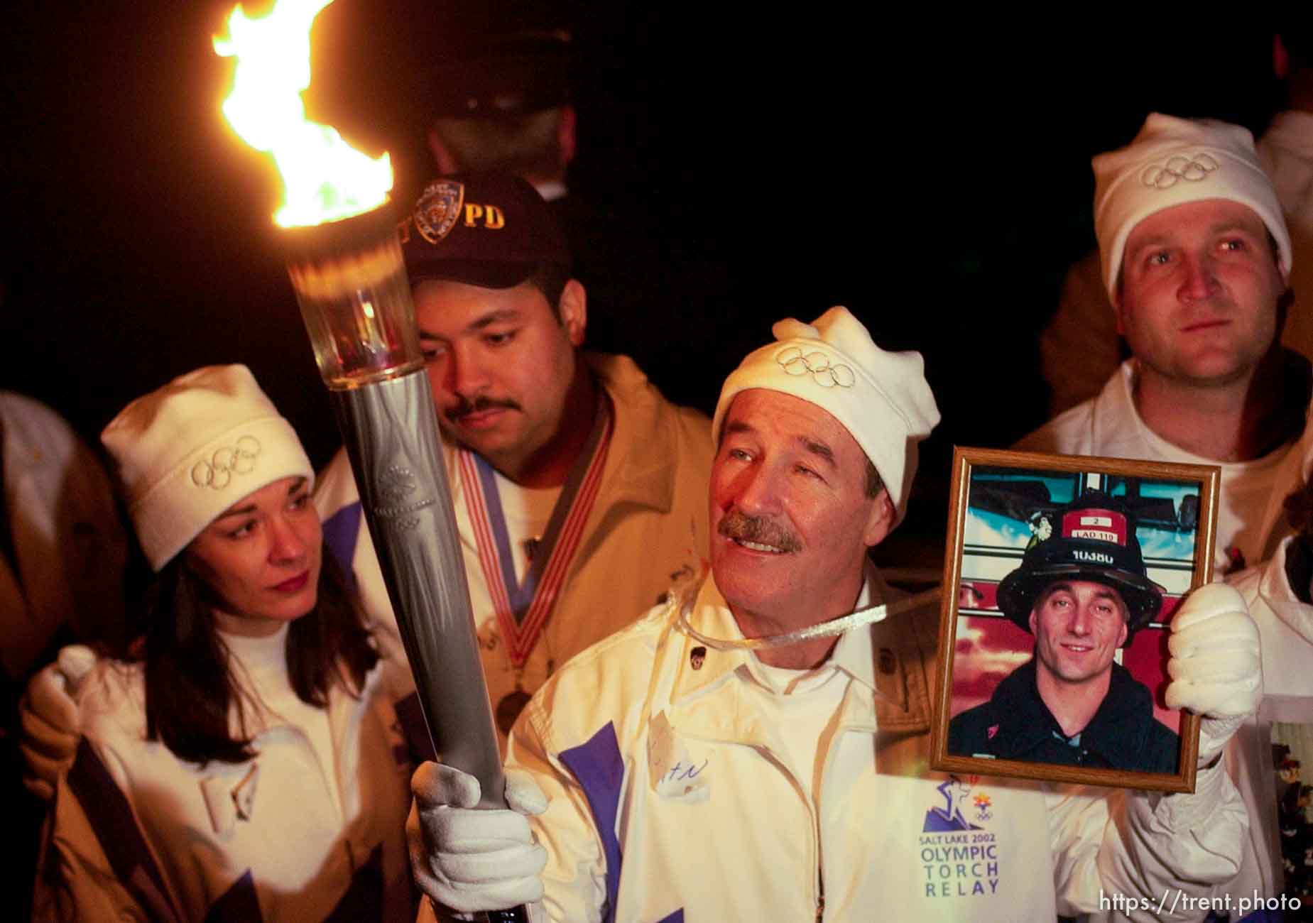 The Olympic Torch commemorates victims and heroes of the World Trade Center attack on a boat near the Statue of Liberty, then proceeds to Rockefeller Plaza where Mayor Giuliani carried the final torch and lit the Olympic cauldron.
 12.23.2001, 5:44:10 PM