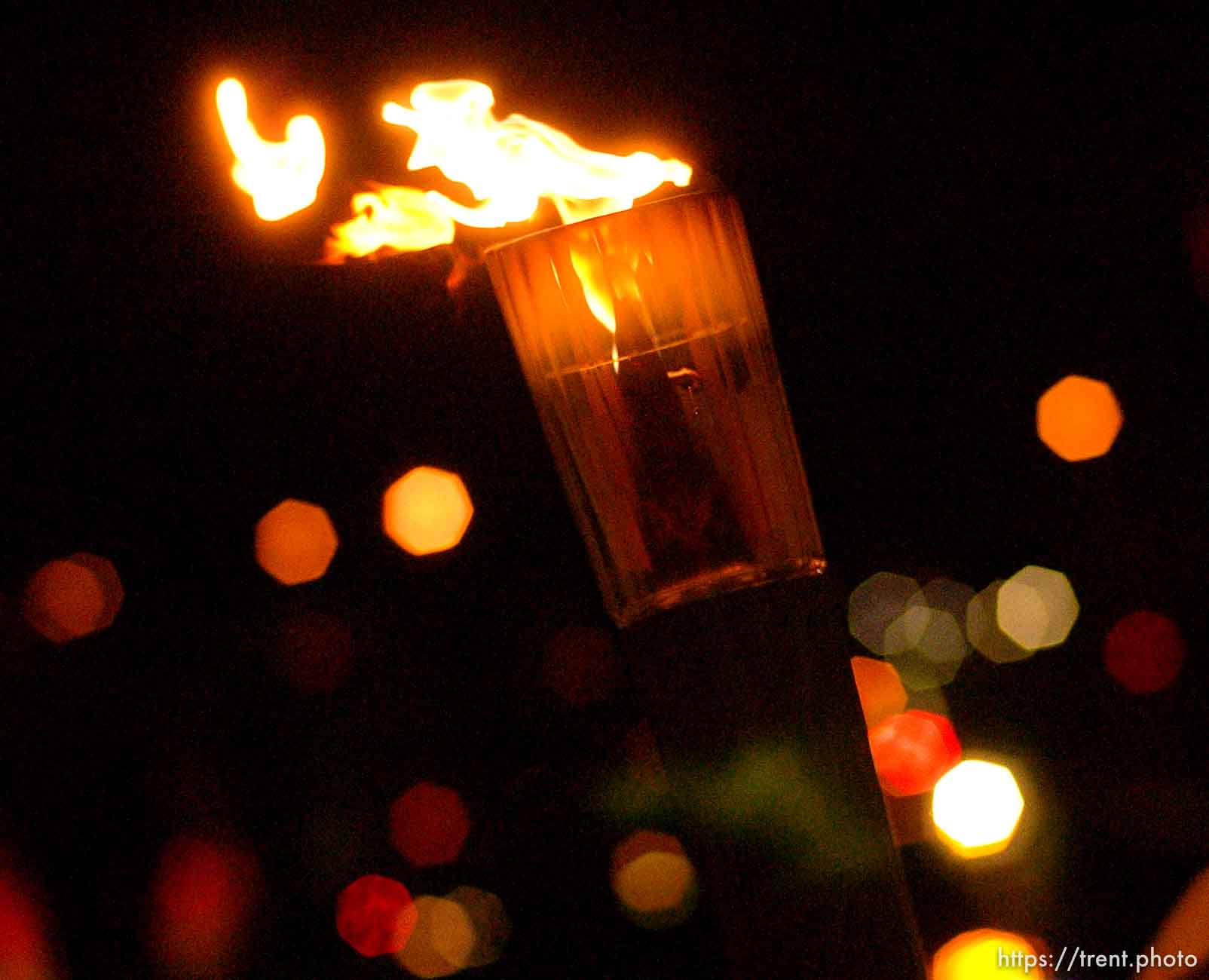 The Olympic Torch commemorates victims and heroes of the World Trade Center attack on a boat near the Statue of Liberty, then proceeds to Rockefeller Plaza where Mayor Giuliani carried the final torch and lit the Olympic cauldron.
 12.23.2001, 6:11:21 PM