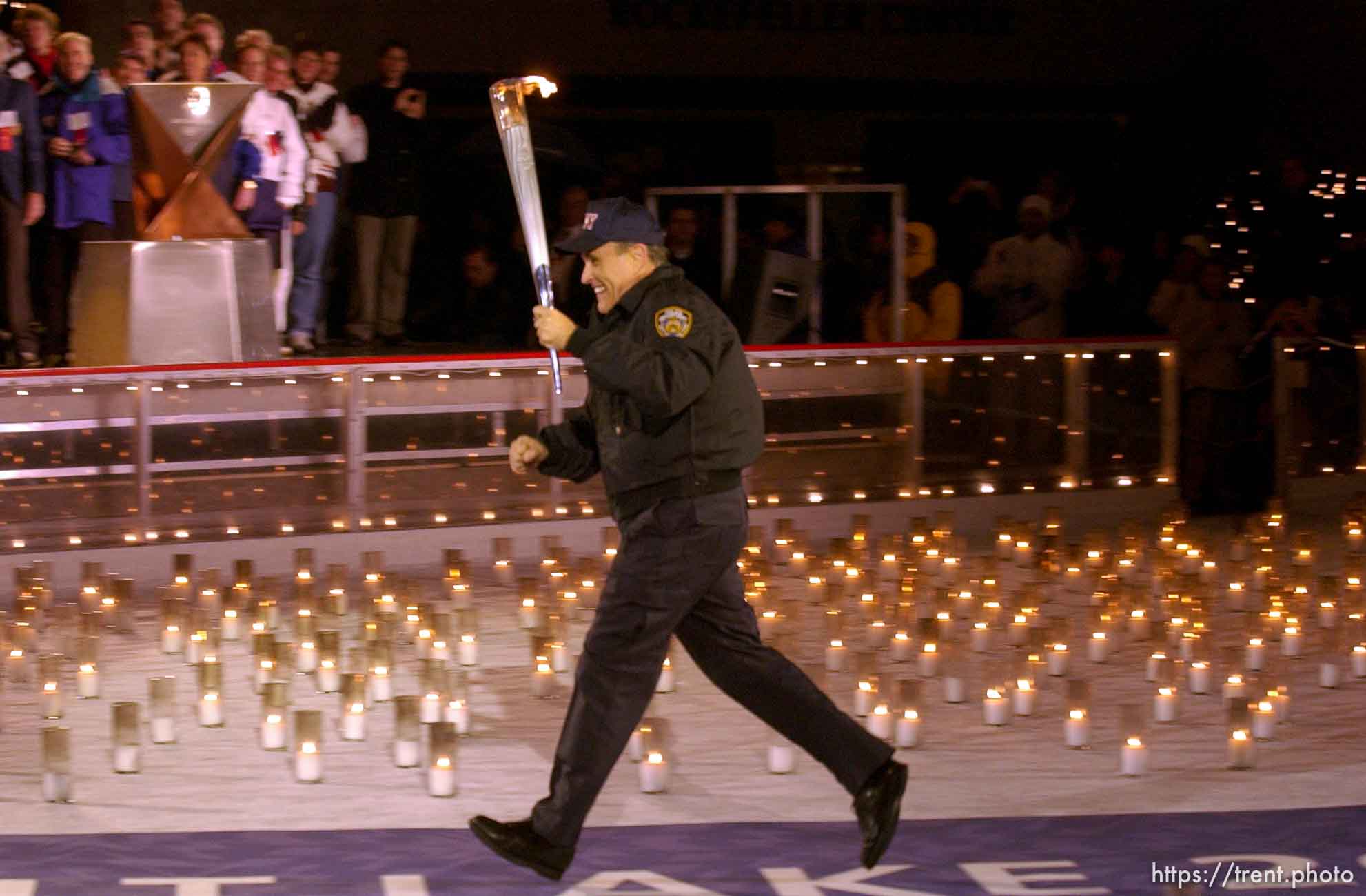 The Olympic Torch commemorates victims and heroes of the World Trade Center attack on a boat near the Statue of Liberty, then proceeds to Rockefeller Plaza where Mayor Giuliani carried the final torch and lit the Olympic cauldron.
 12.23.2001, 6:34:38 PM