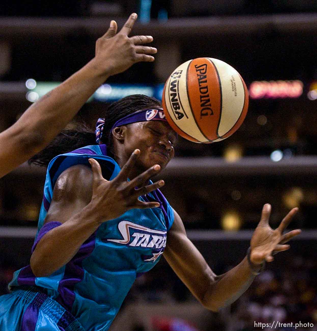 The ball bounces on Starzz guard Marie Ferdinand. Los Angeles Sparks vs. Utah Starzz, game two, WNBA playoffs. 08.24.2002, 2:29:04 PM