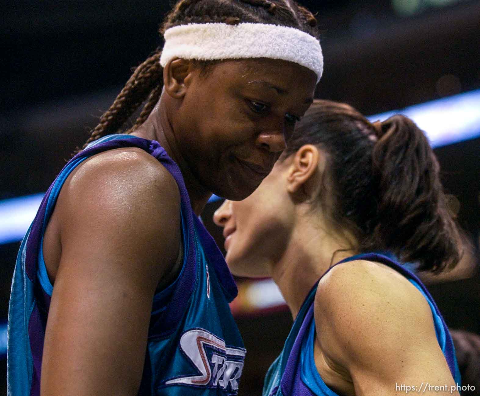 Adrienne Goodson leaves the court near the end of Utah's elimination loss Saturday (Jennifer Azzi at rear). Los Angeles Sparks vs. Utah Starzz, game two, WNBA playoffs. 08.24.2002, 3:55:03 PM