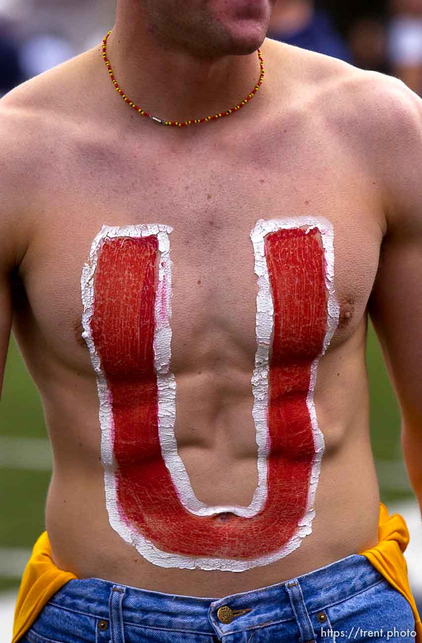 Salt Lake City - U on bare chest. Utah fans. Utah vs. BYU football Saturday afternoon at Rice-Eccles Stadium. Utah wins 13-6.  11.23.2002, 2:26:12 PM