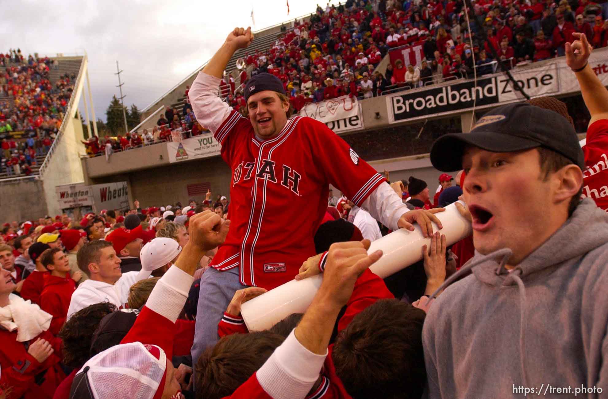 Salt Lake City - Fans bring down the goalposts. Utah vs. BYU football Saturday afternoon at Rice-Eccles Stadium. Utah wins 13-6.  11.23.2002, 4:13:24 PM