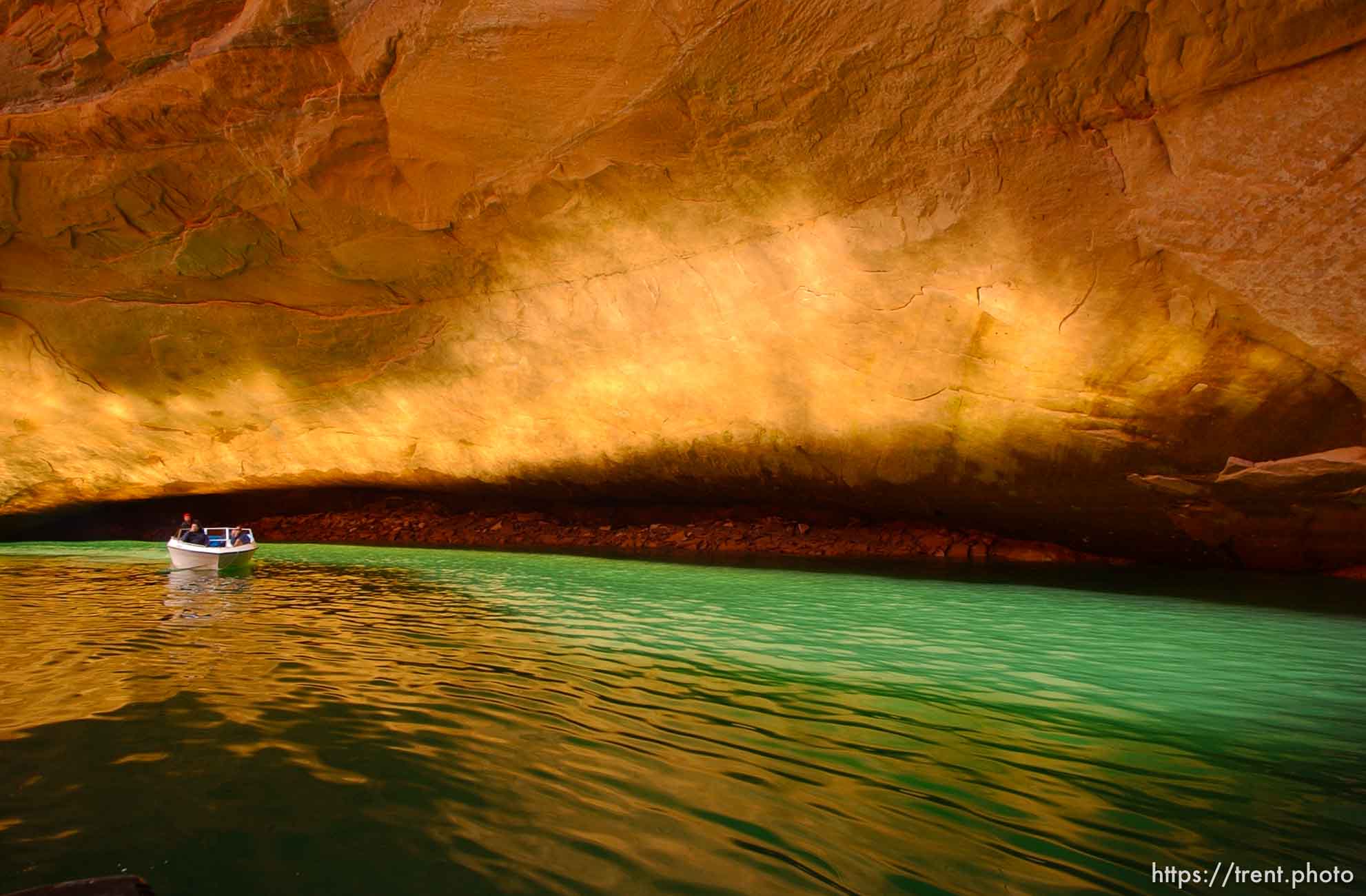 Light plays on the rocks at Cathedral of the Desert, Clear Creek, Lake Powell. Landmarks which had previously been submerged in Glen Canyon are now becoming visible with the lower water levels in Lake Powell.