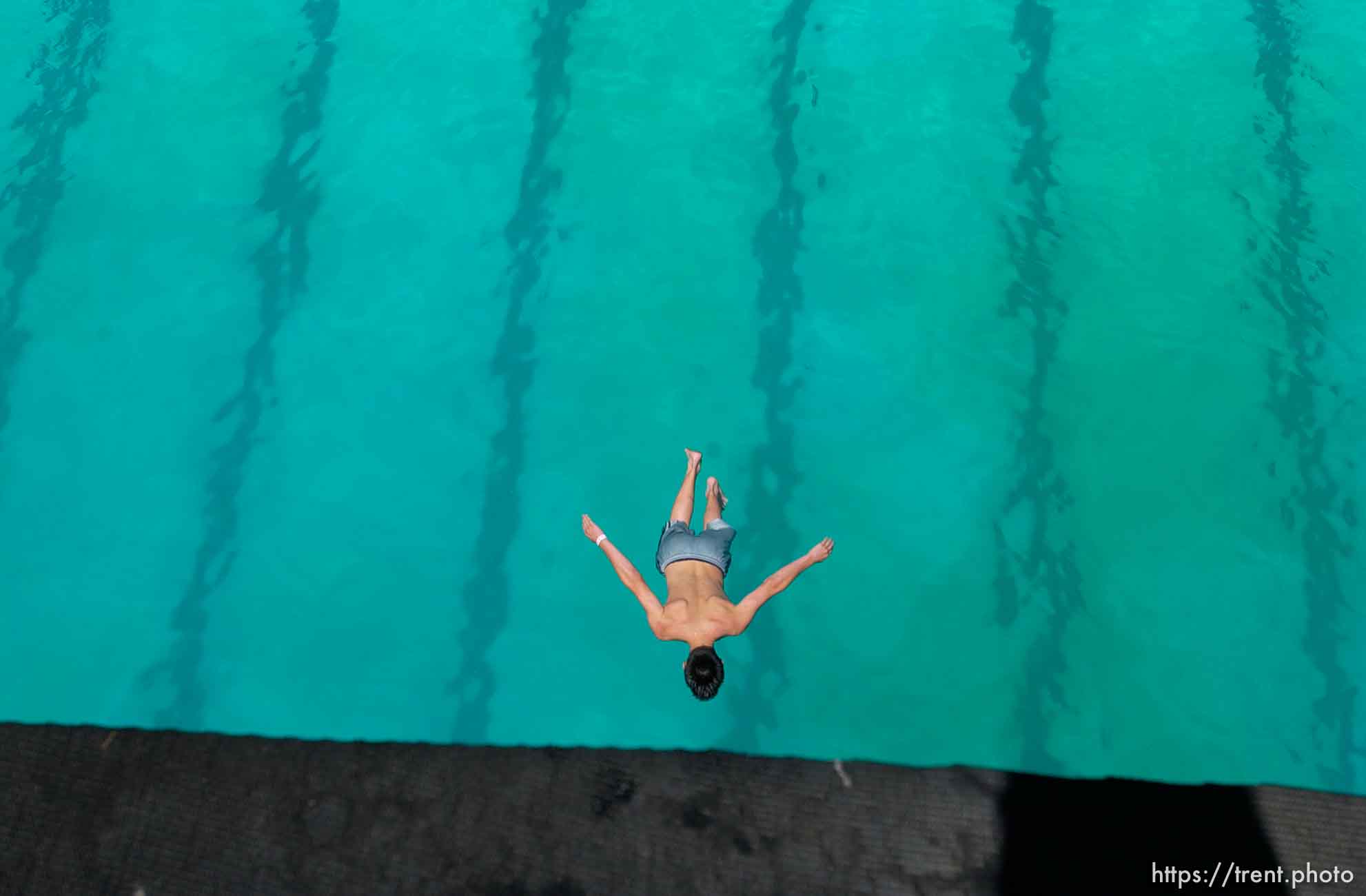 Leaping off the ten meter platform at the Kearns Oquirrh Park Fitness Center in Kearns Wednesday afternoon.