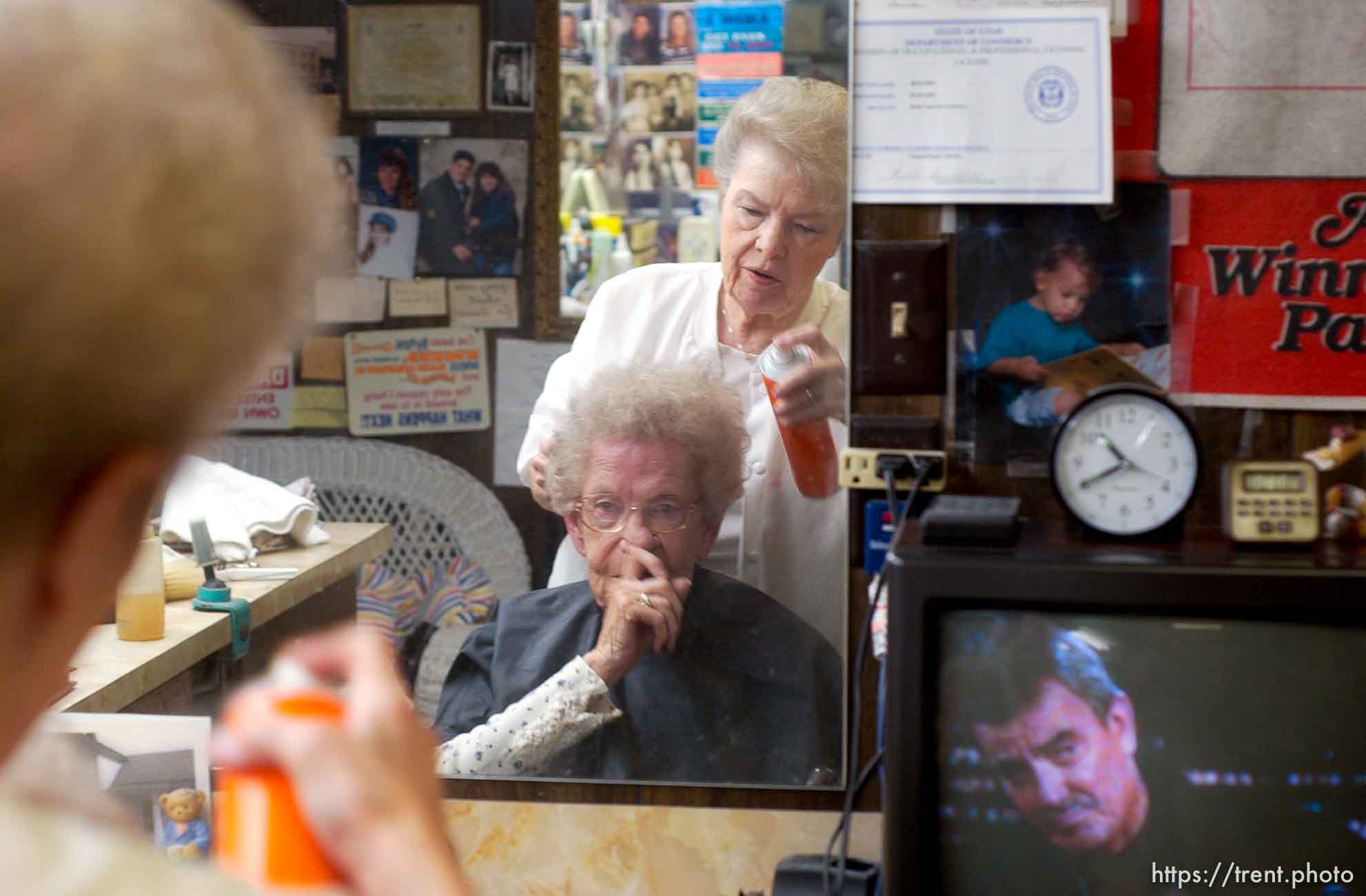 Sandy - Ruth Saunders has been cutting hair since 1946. She has a small shop in the basement of her Sandy home, where she sees regular customers like Vivian Keysaw, who has been having Saunders cut her hair for 45 years.