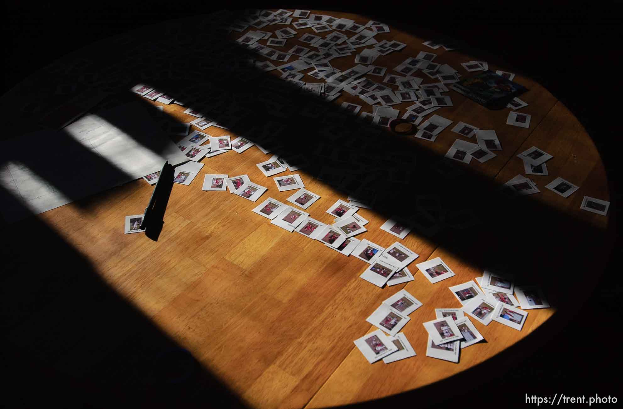 photos on the table for a composite of a soccer game (project later abandoned- too big) 3/29/04