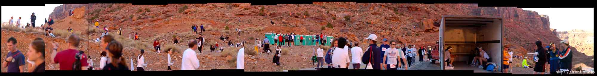 Runners waiting on red rock for the start of the Canyonlands Half Marathon in Moab