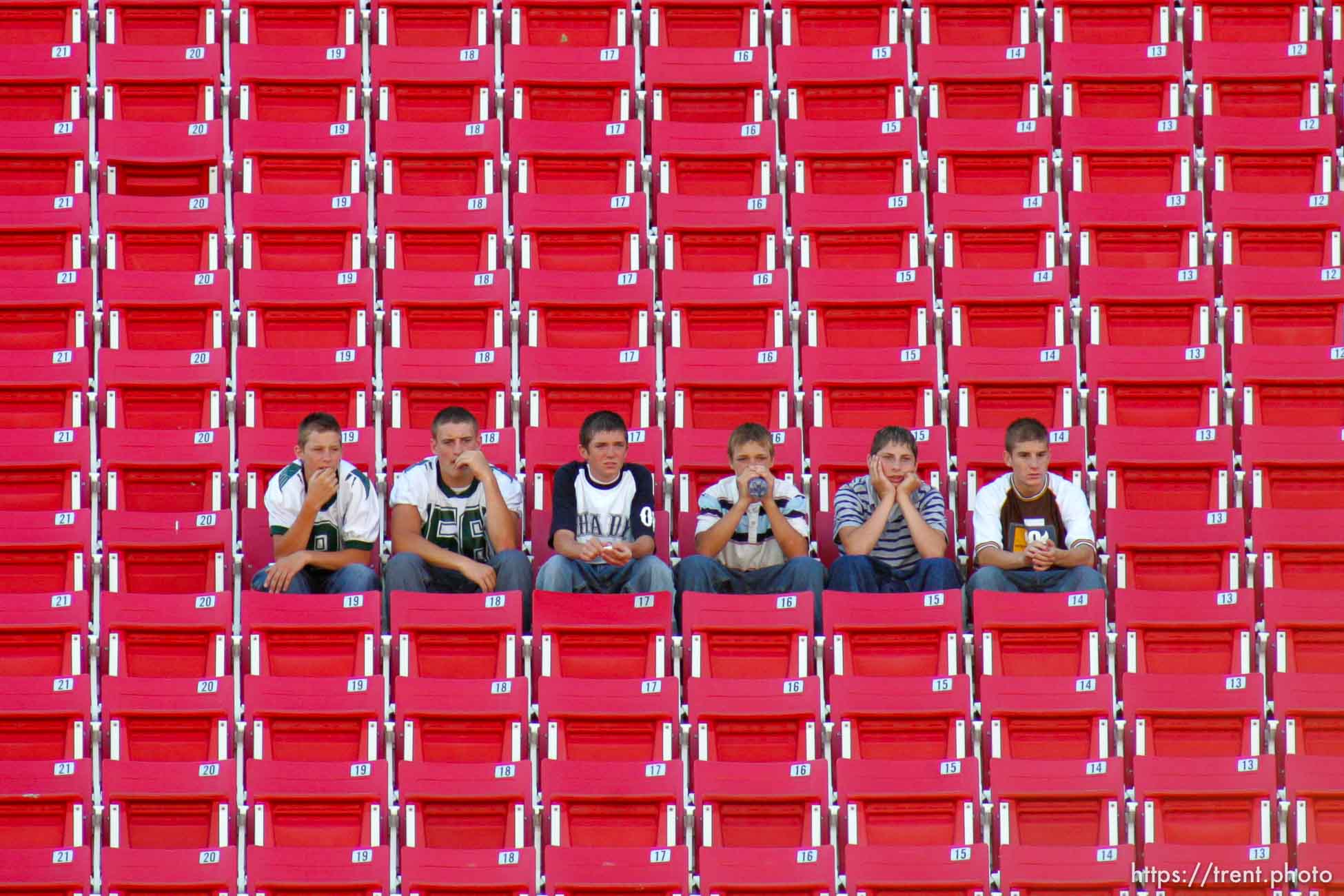 fan and empty seats. Bonneville vs. Clearfield high school football Saturday afternoon at Rice-Eccles Stadium.