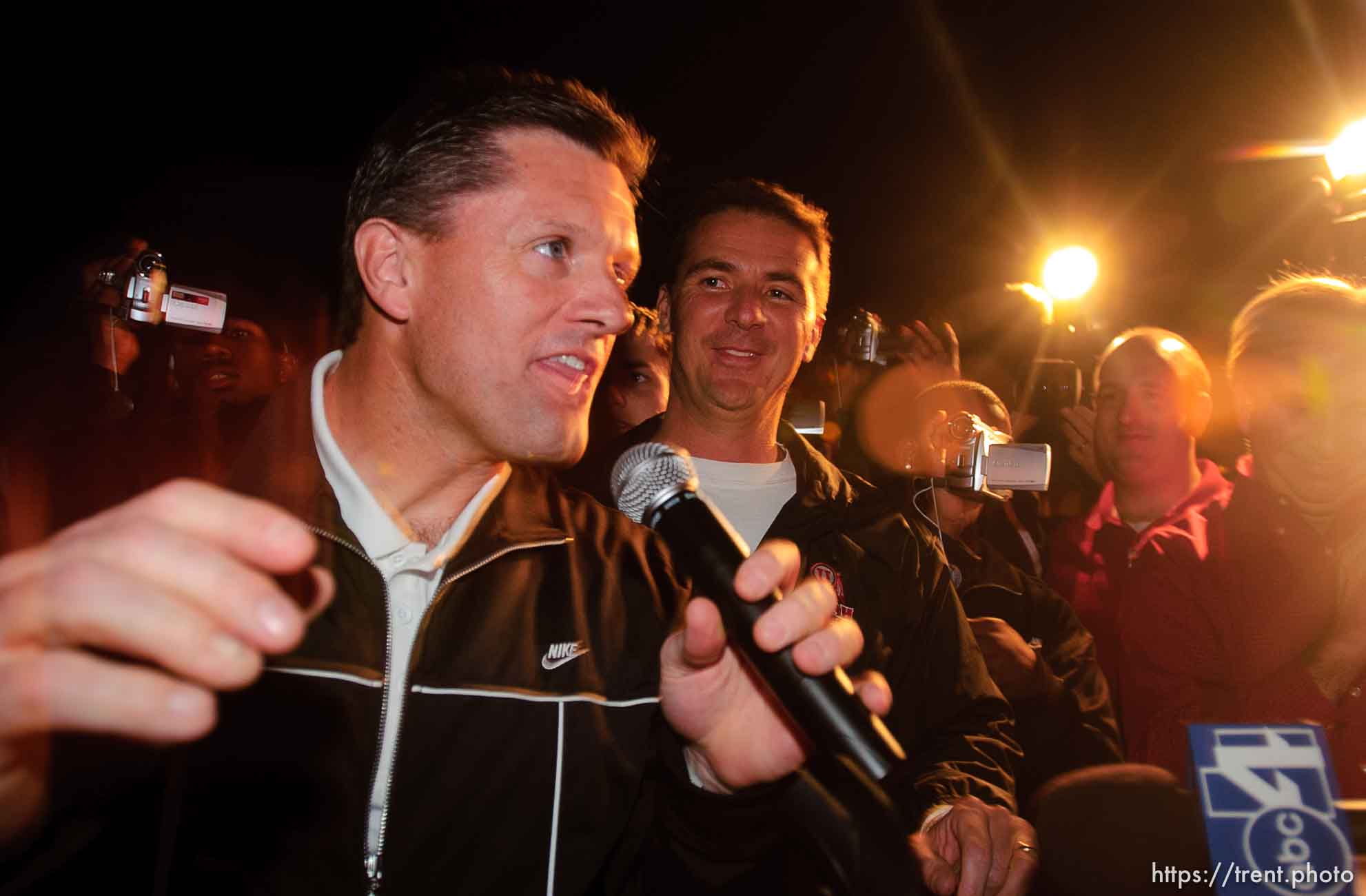 coaches kyle whittingham, urban meyer. The Utah football team and their Fiesta Bowl appearance was the focus of a large pep rally was held Thursday evening at the Point South Mountain Resort. A large crowd of Utah fans was joined by the school band and cheerleaders.