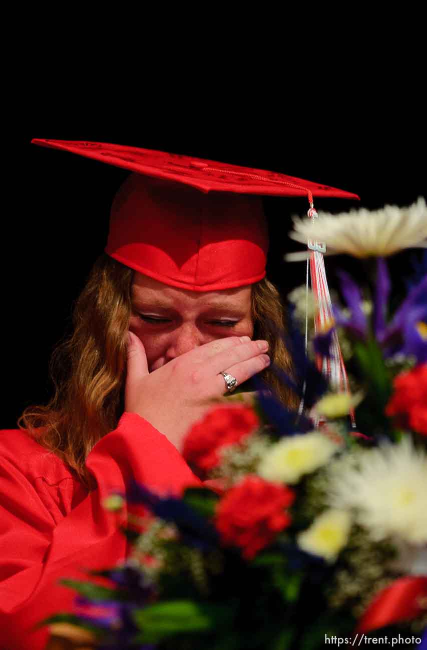 East Carbon High School valedictorian Amanda Hepworth chokes up as she thanks the people who helped her class through their education- faculty, administrators, volunteers, families and friends.