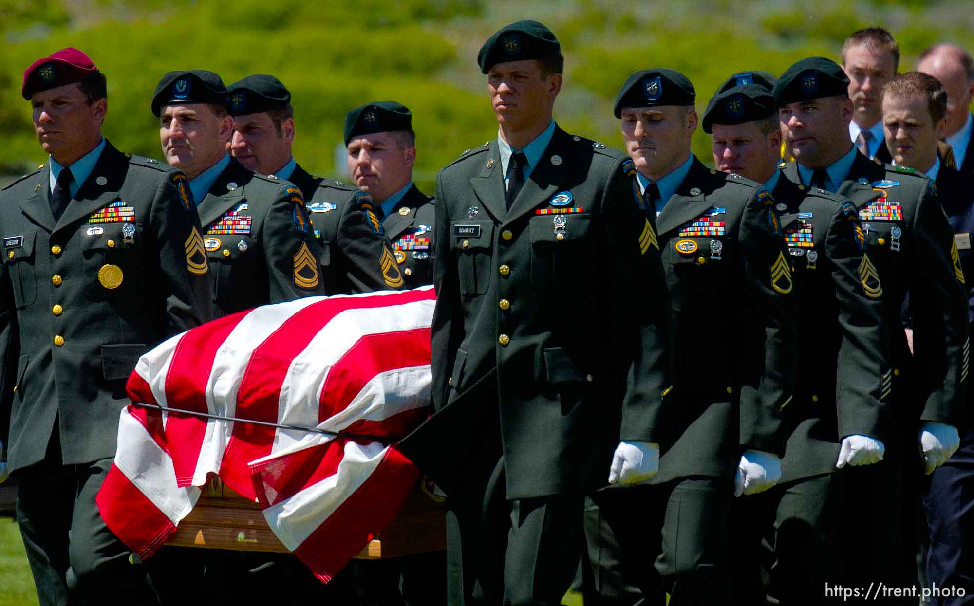 An honor guard from the 19th Special Forces Group (Airborne) serve as pallbearers at the funeral for Brandon Thomas, a green beret killed in Iraq while working as a civilian security contractor.
Photo by Trent Nelson; 5.24.2005