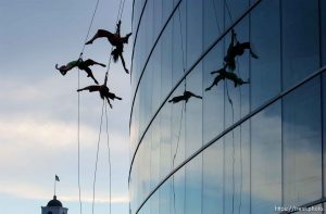 Dancers from Project Bandaloop perform aerial acrobatics on the south face of the Salt Lake City downtown library, during a performance at the Utah Arts Festival Saturday evening.
6.25.2005